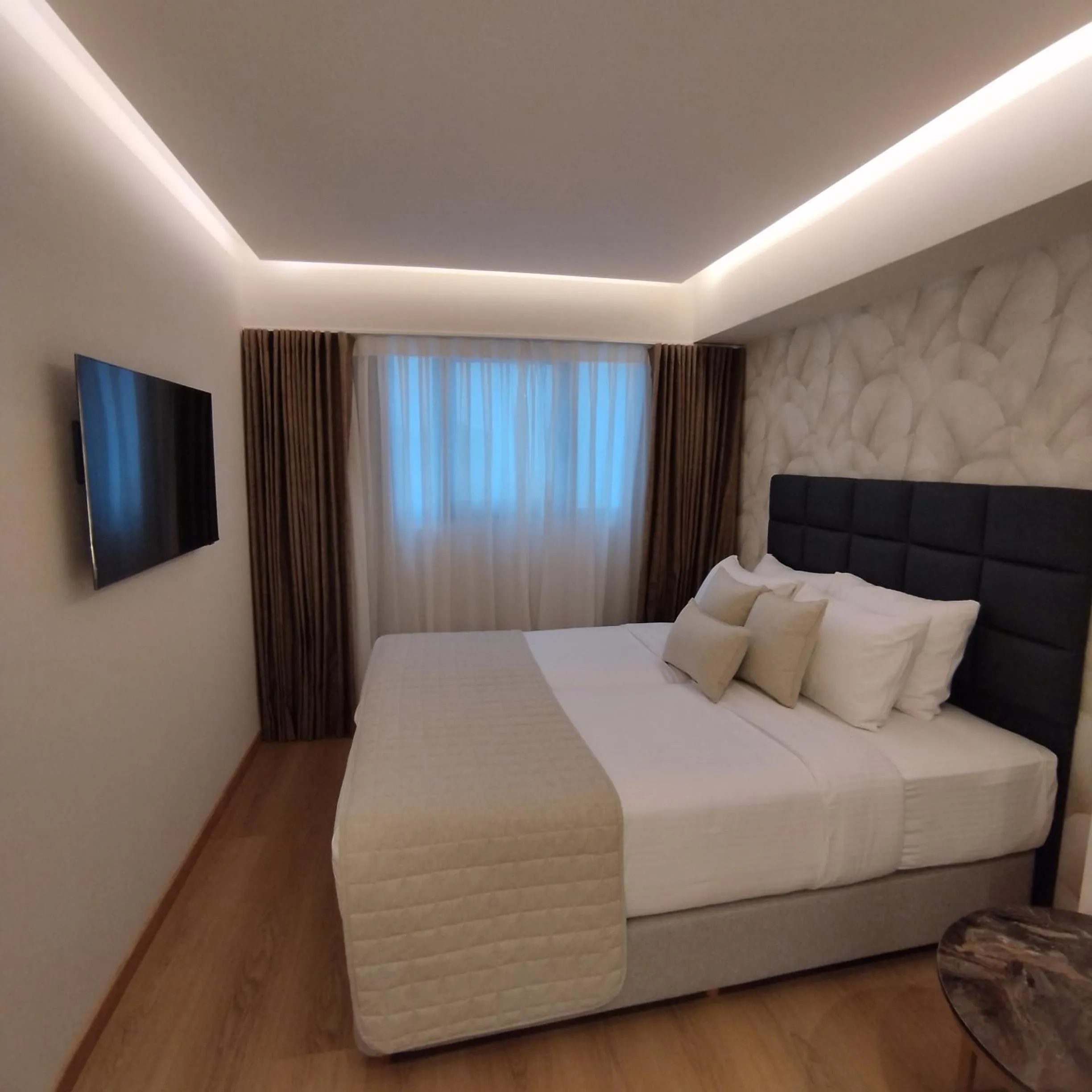 Bed in Great Athens Hotel