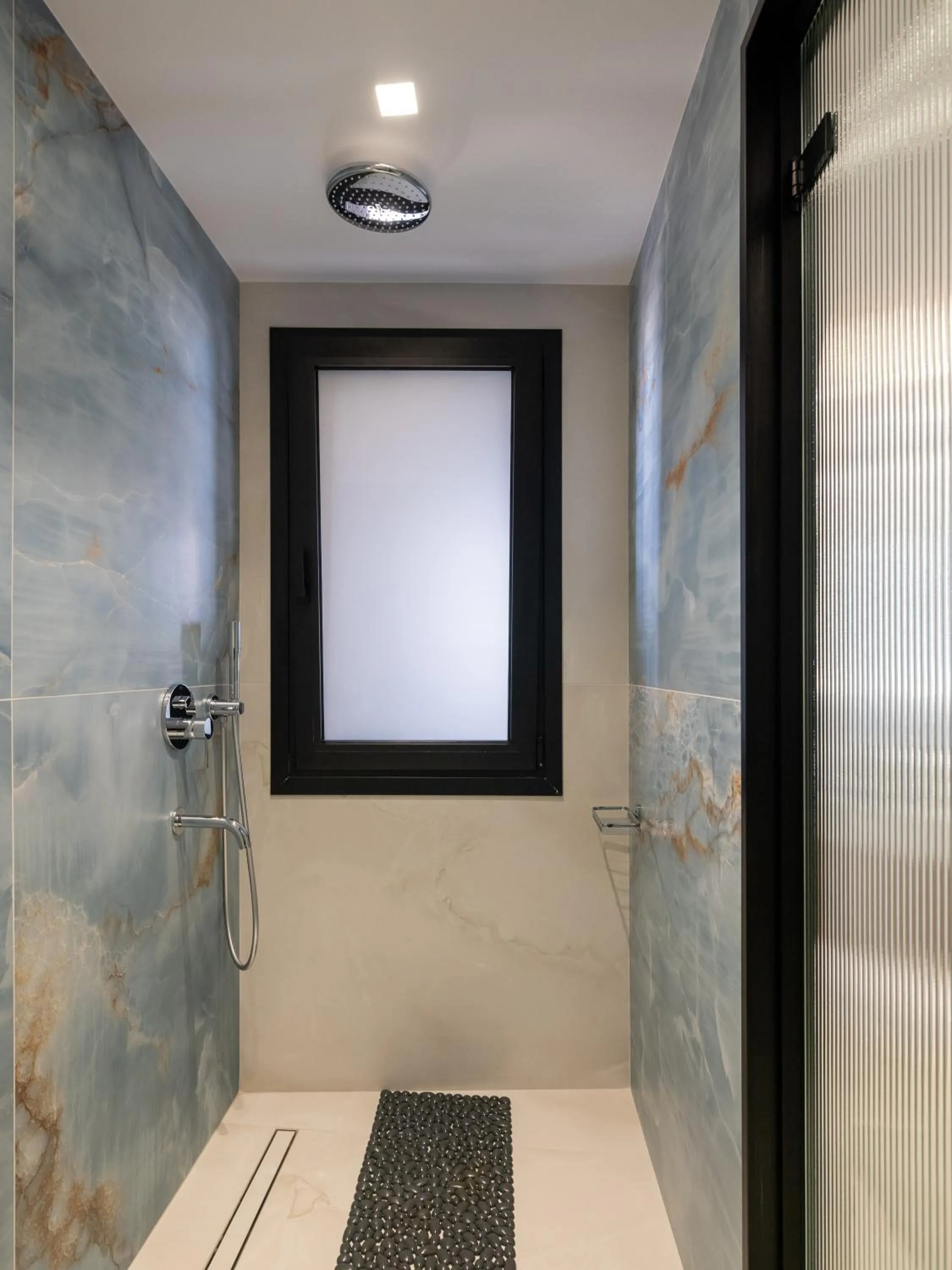Shower in Captain Napoleon Paterakis CNP Luxurious Suites