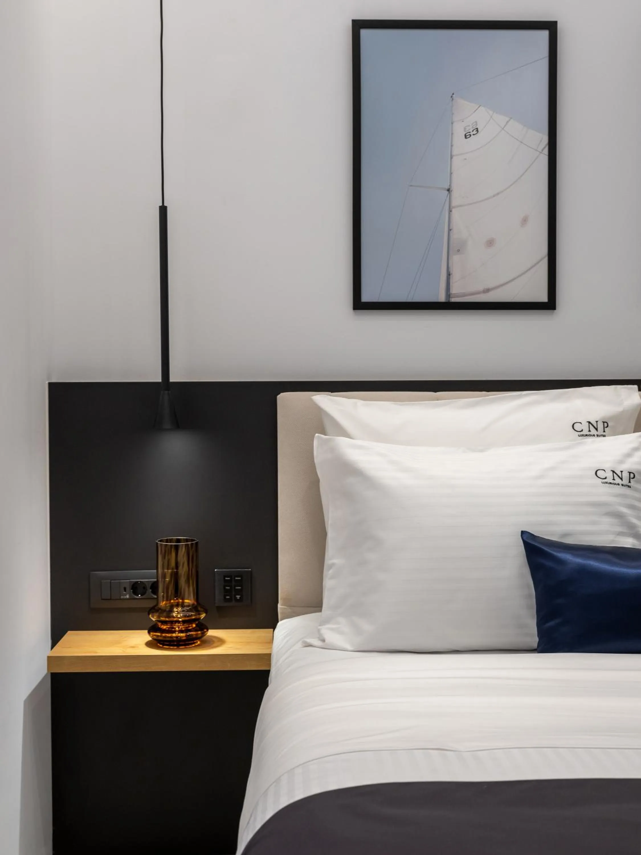 Bed in Captain Napoleon Paterakis CNP Luxurious Suites