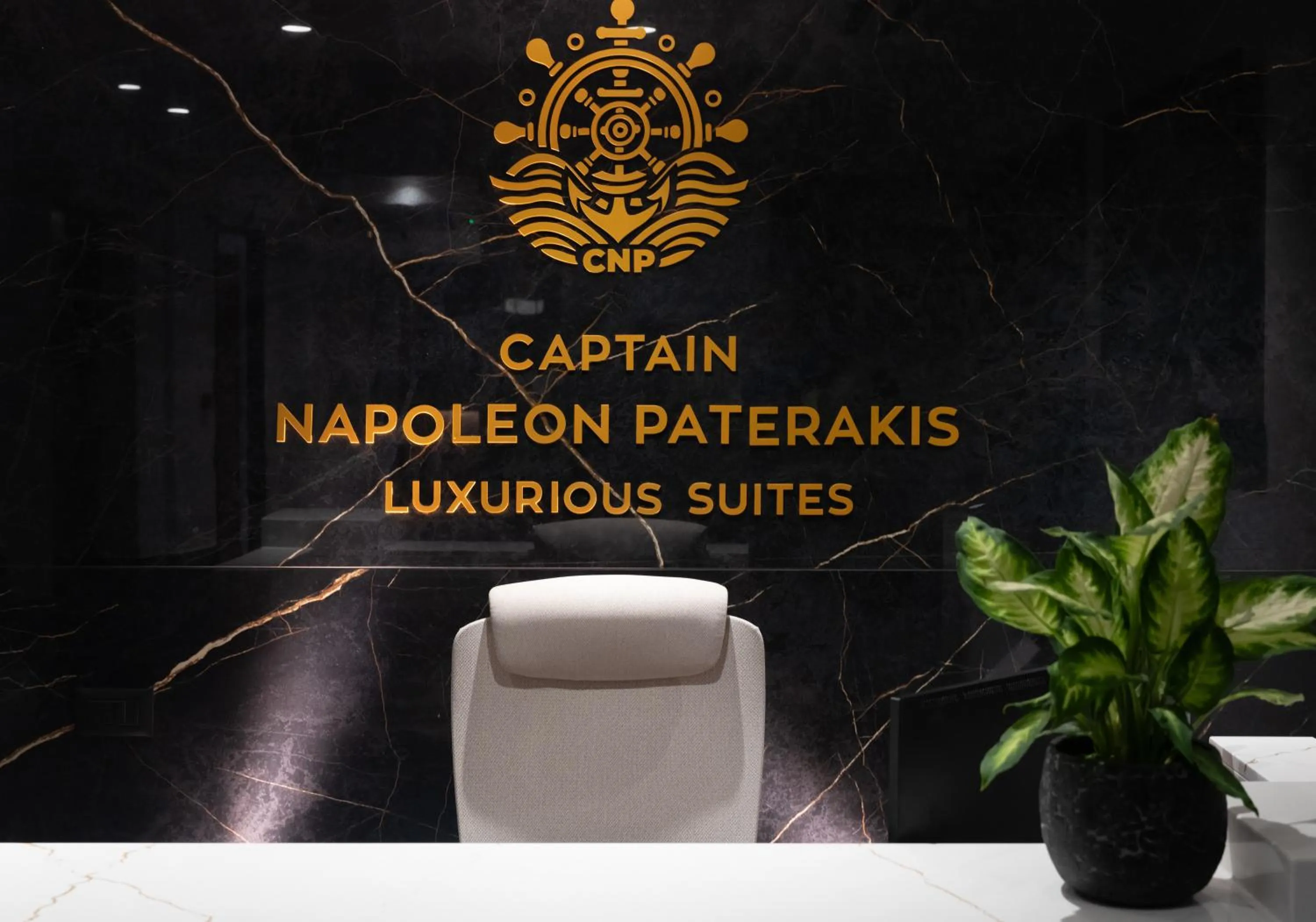 Property logo or sign in Captain Napoleon Paterakis CNP Luxurious Suites