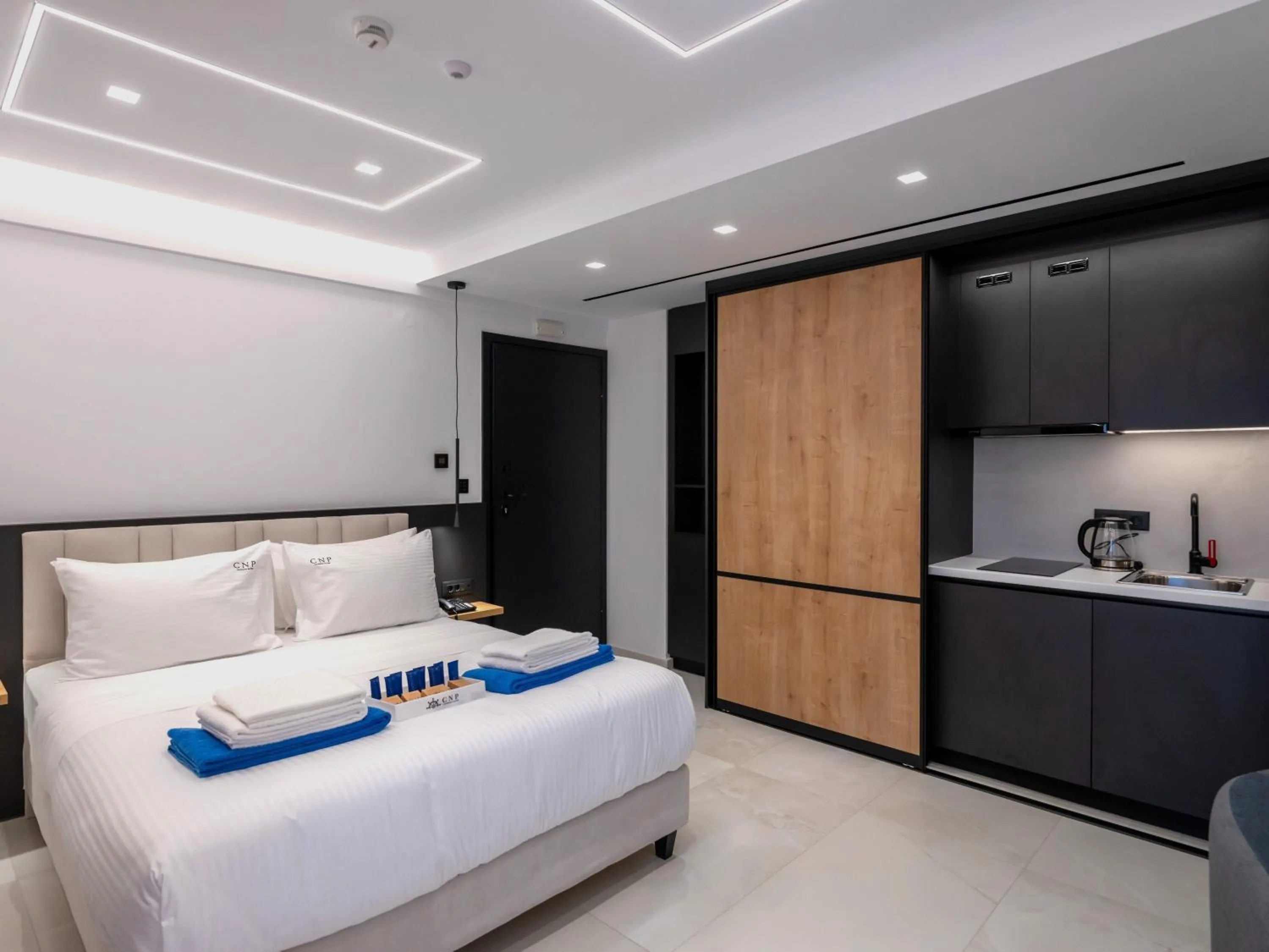 Bed in Captain Napoleon Paterakis CNP Luxurious Suites