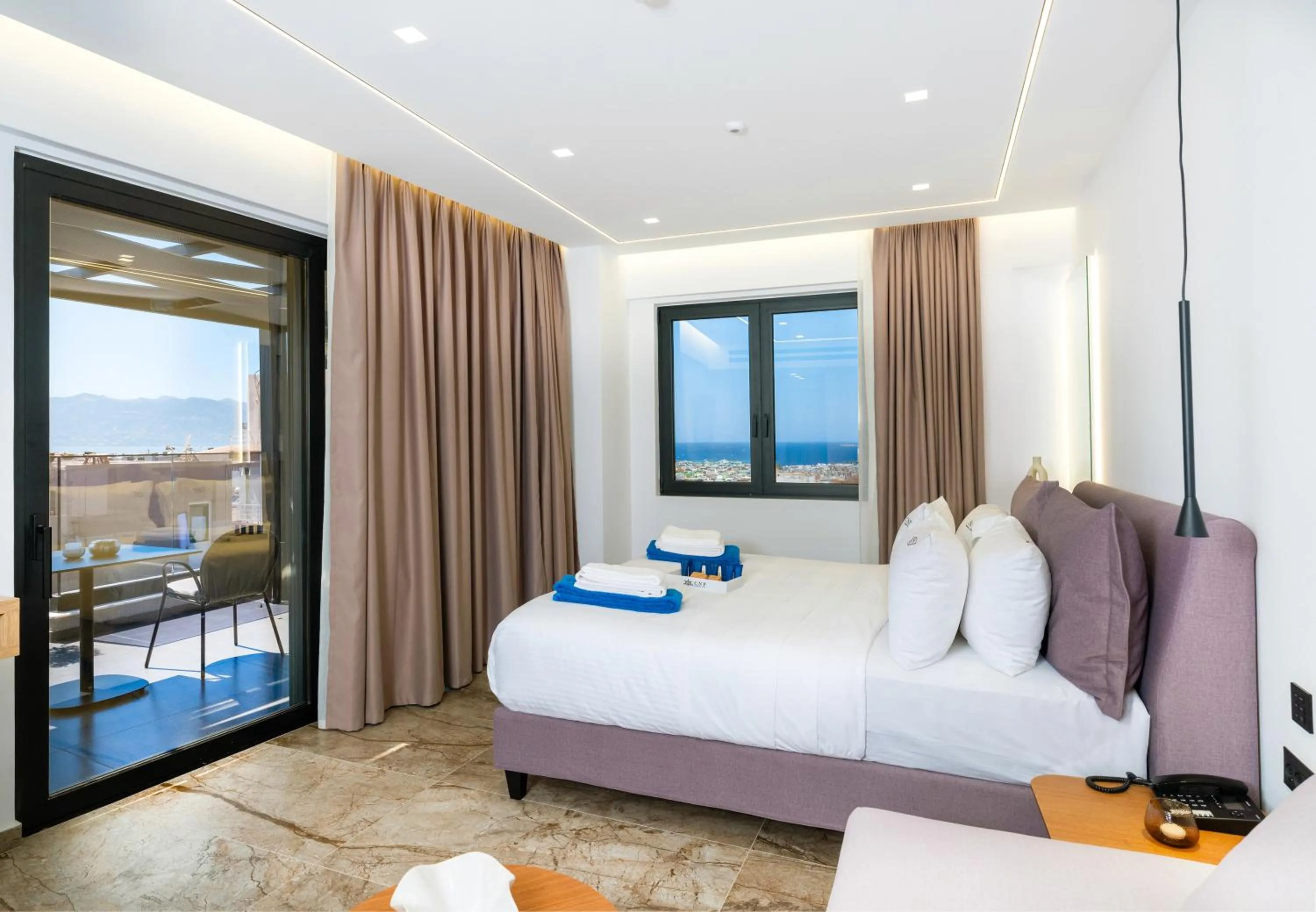 Bed in Captain Napoleon Paterakis CNP Luxurious Suites
