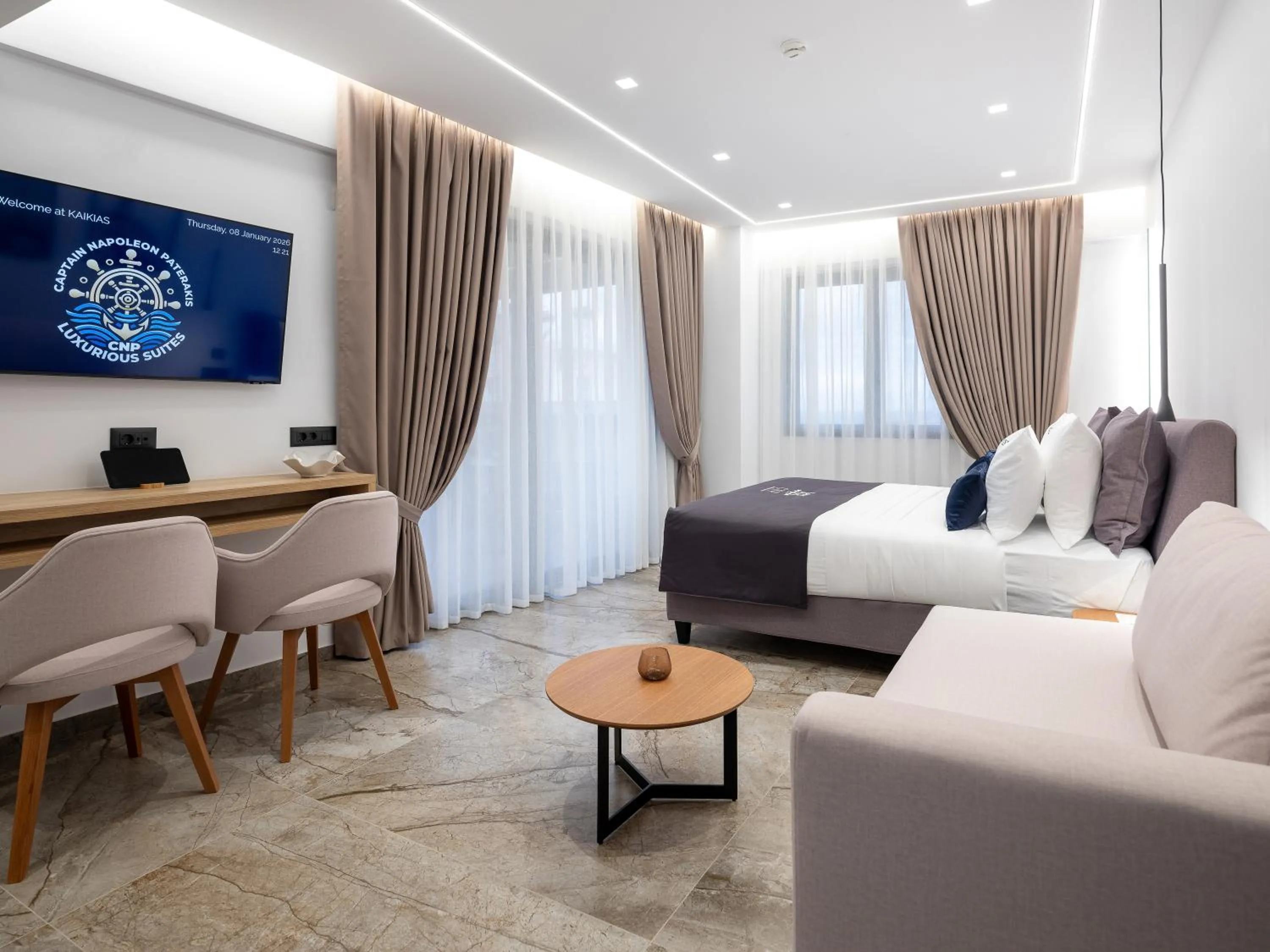 Bed in Captain Napoleon Paterakis CNP Luxurious Suites