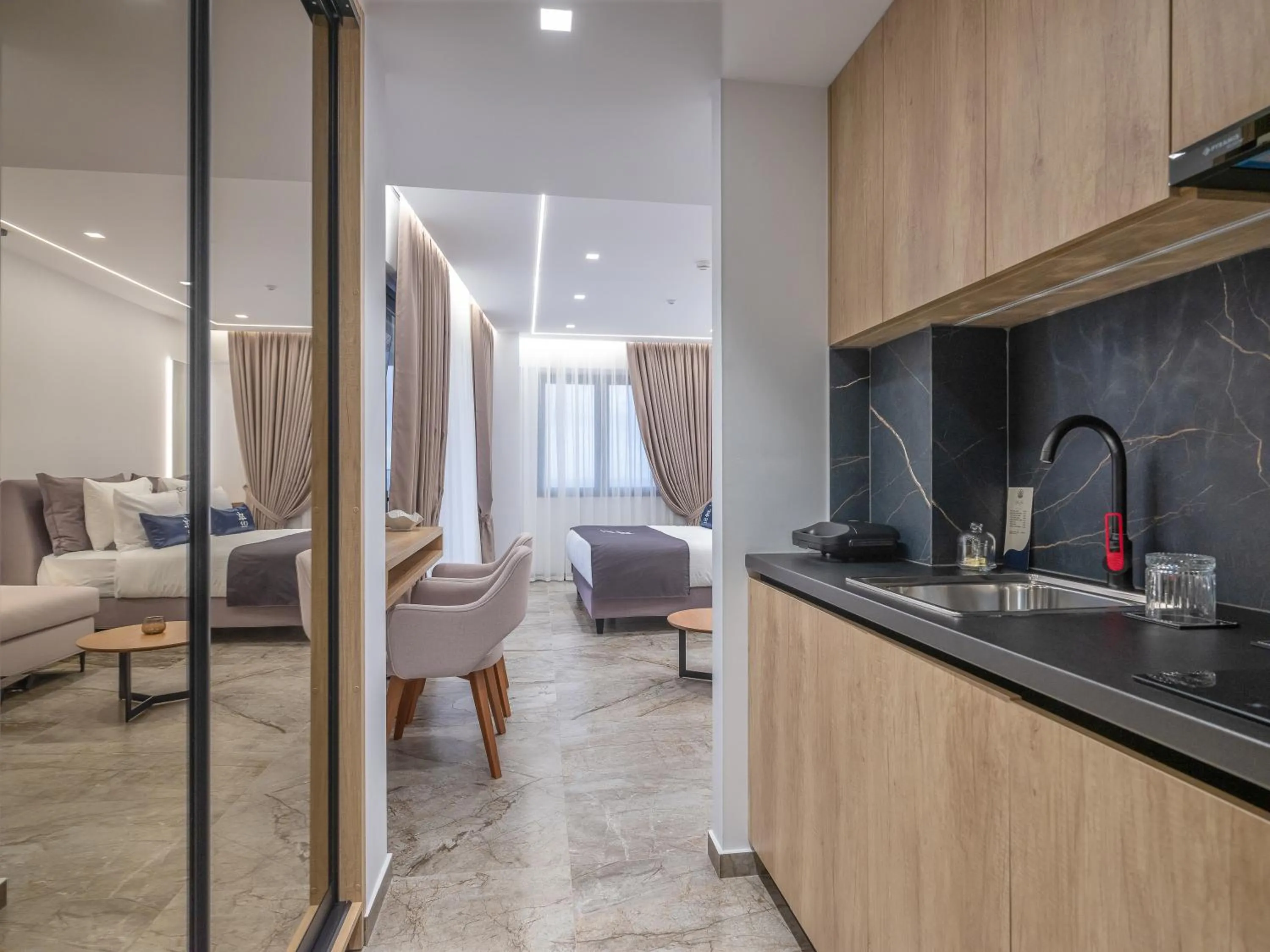 wardrobe in Captain Napoleon Paterakis CNP Luxurious Suites