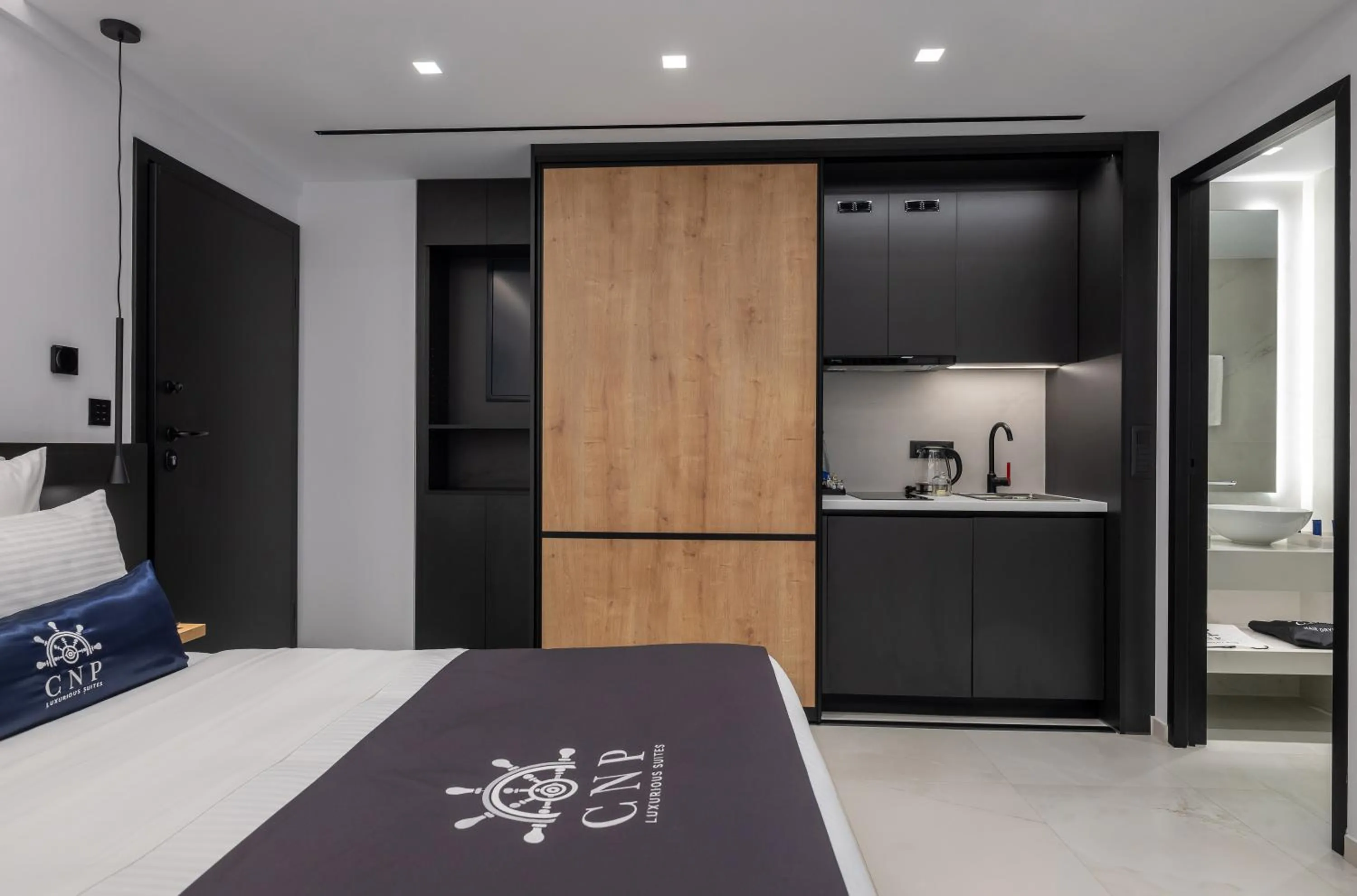 Bed in Captain Napoleon Paterakis CNP Luxurious Suites