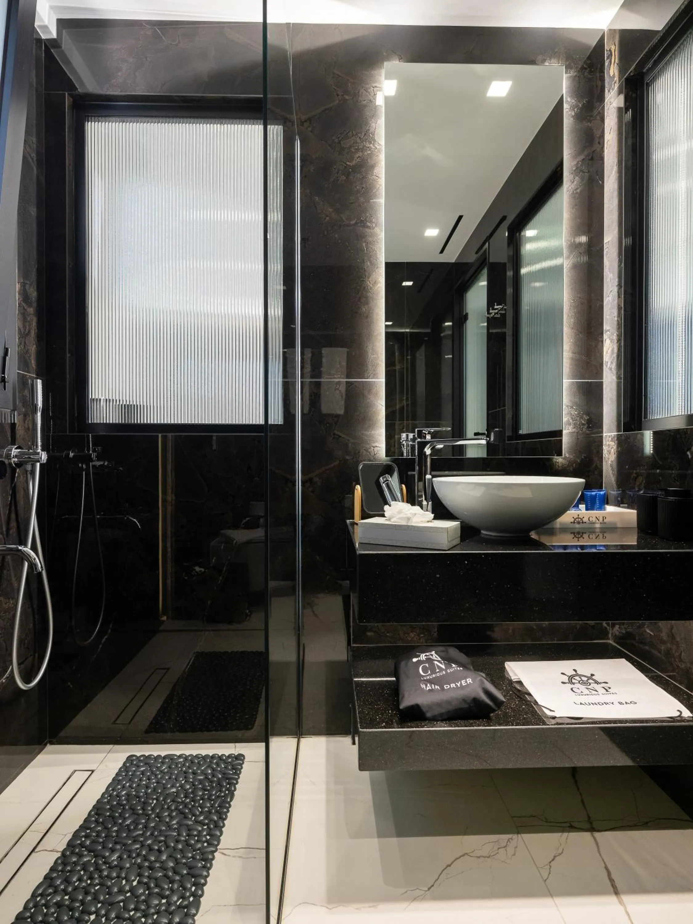 Shower in Captain Napoleon Paterakis CNP Luxurious Suites