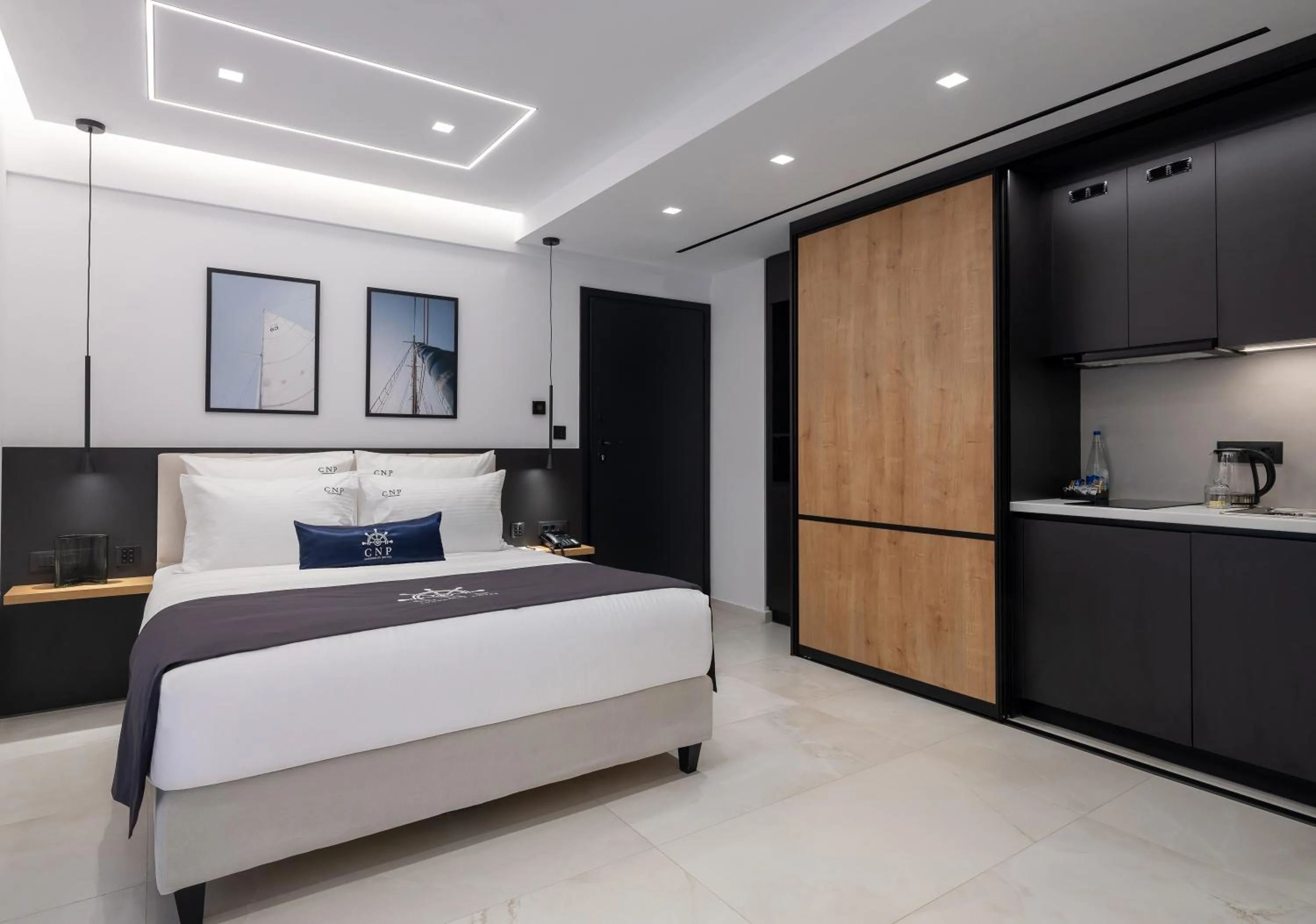 Bed in Captain Napoleon Paterakis CNP Luxurious Suites