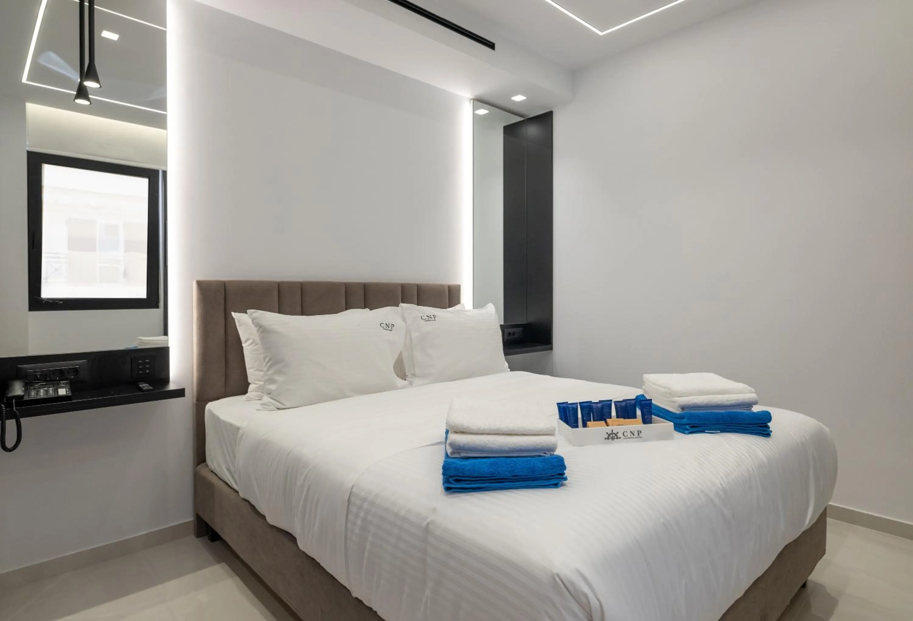 Bed in Captain Napoleon Paterakis CNP Luxurious Suites