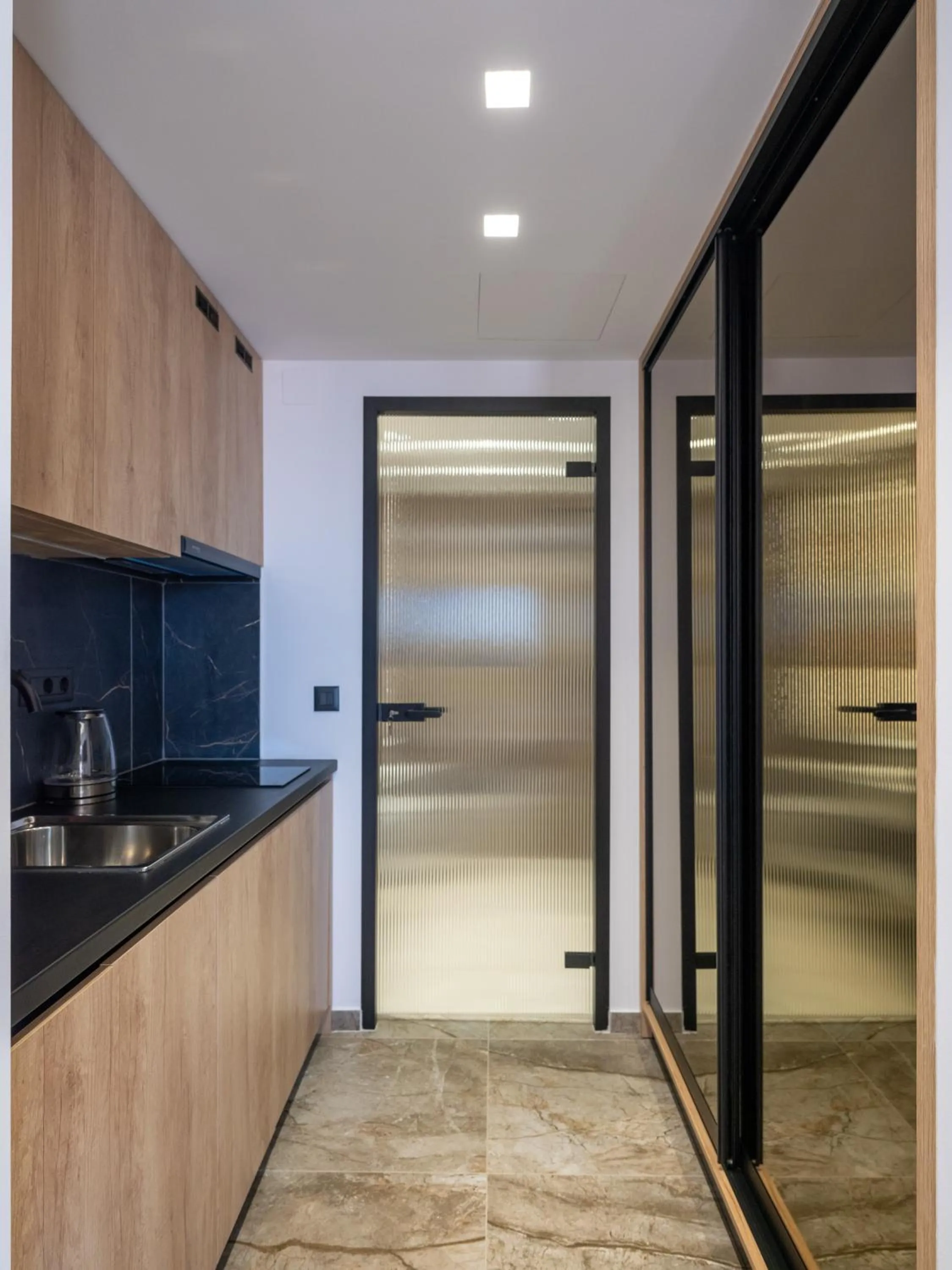 kitchen in Captain Napoleon Paterakis CNP Luxurious Suites