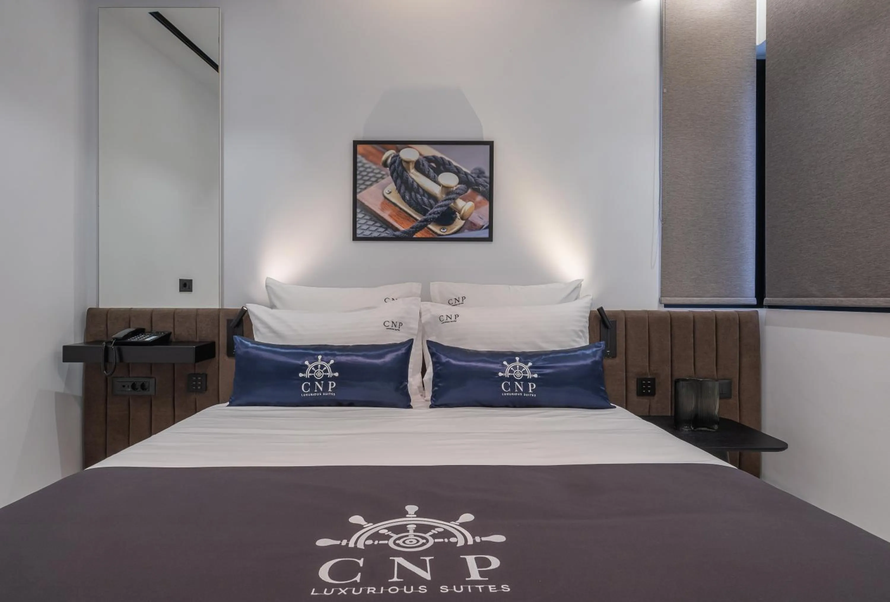 Bed in Captain Napoleon Paterakis CNP Luxurious Suites