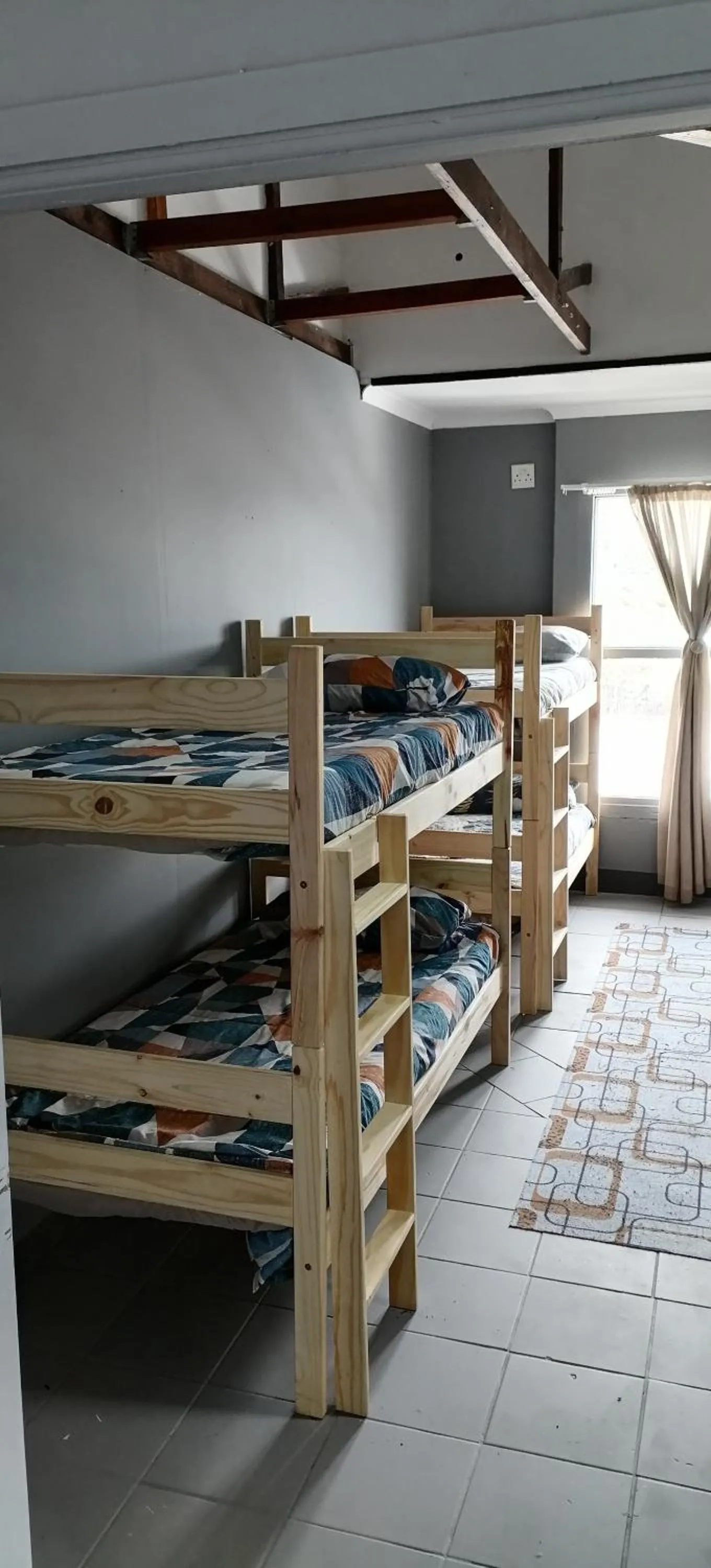 Bed in Mile Crunchers Backpackers & Hostelling