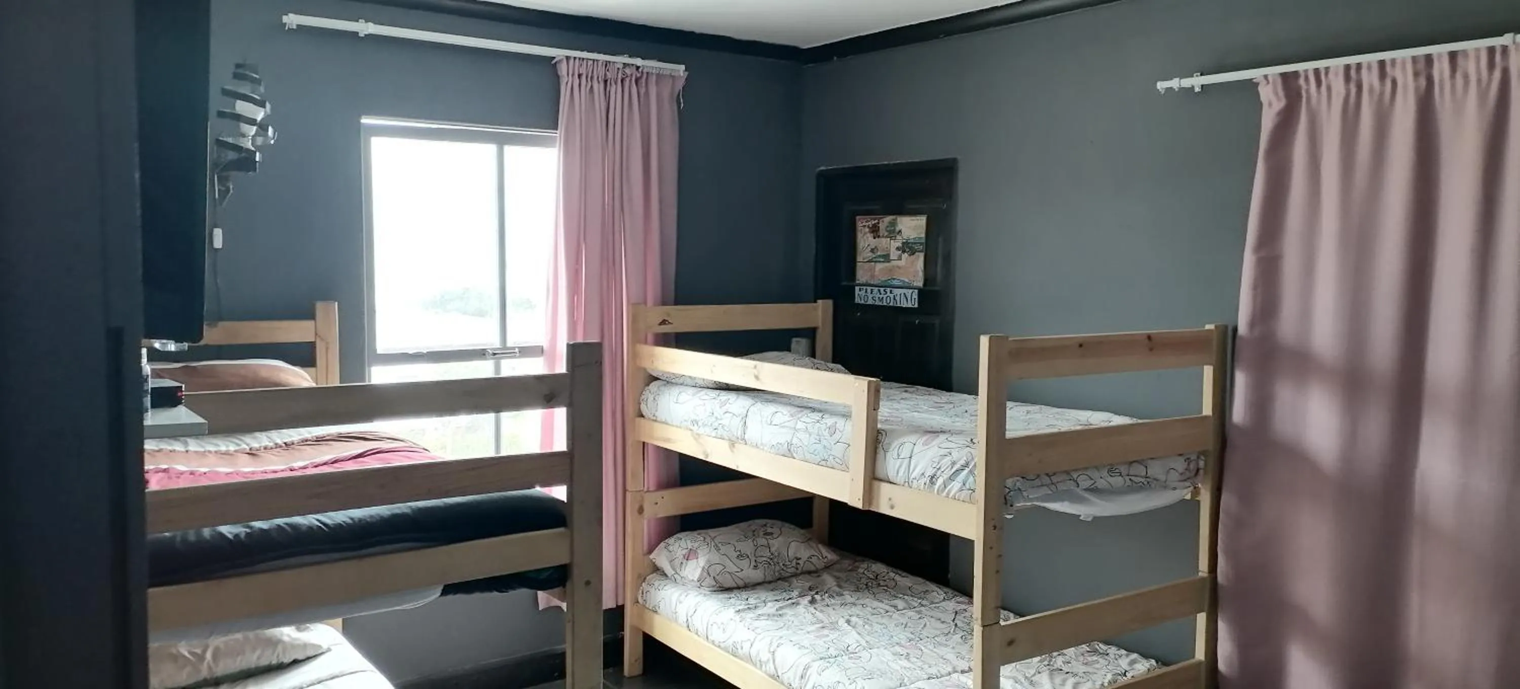 Bed in Mile Crunchers Backpackers & Hostelling