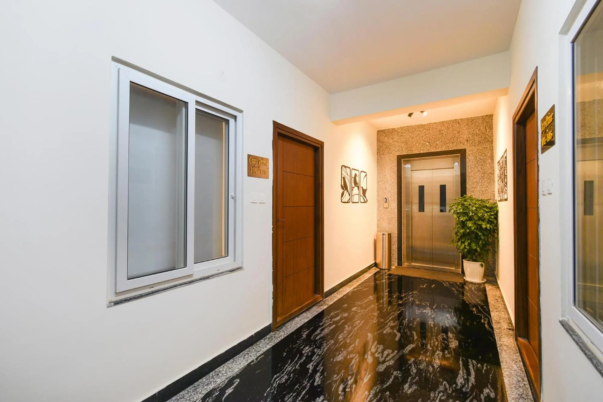 elevator in FabHotel Prime Cozy - Nr Yashoda Hospital, Hitech City