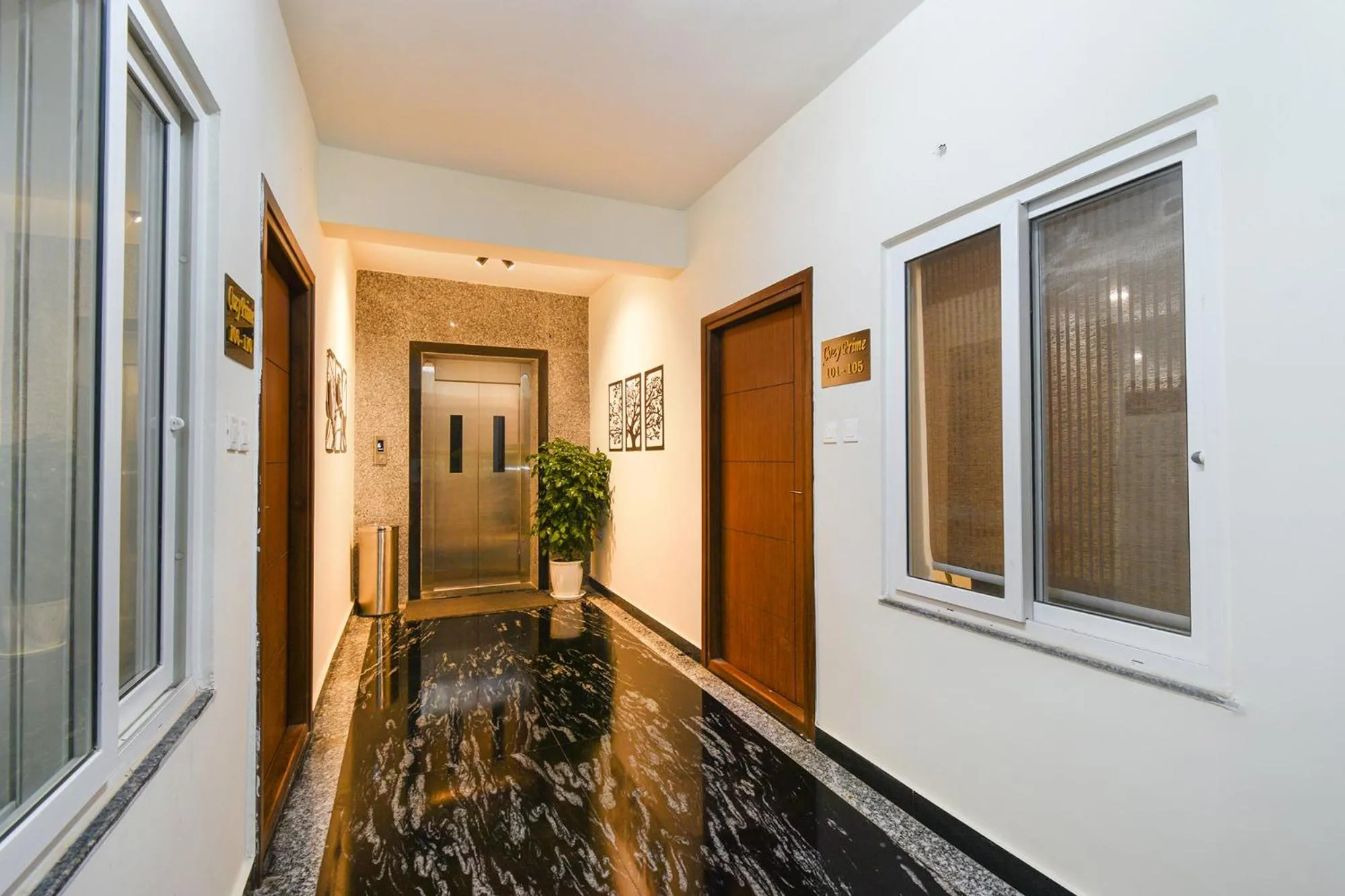 elevator in FabHotel Prime Cozy - Nr Yashoda Hospital, Hitech City
