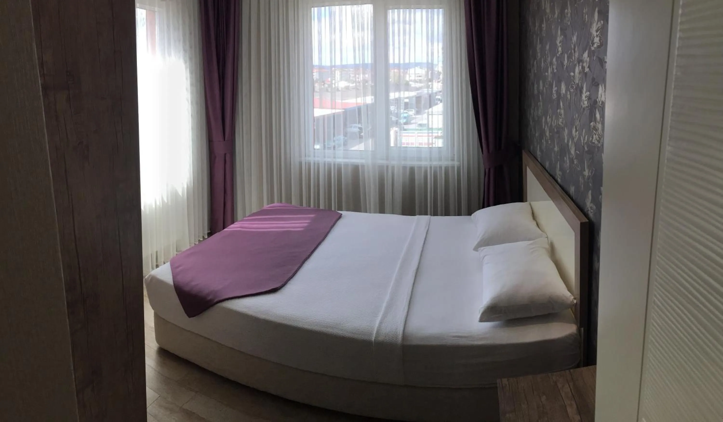 Bed in Udi Hotel