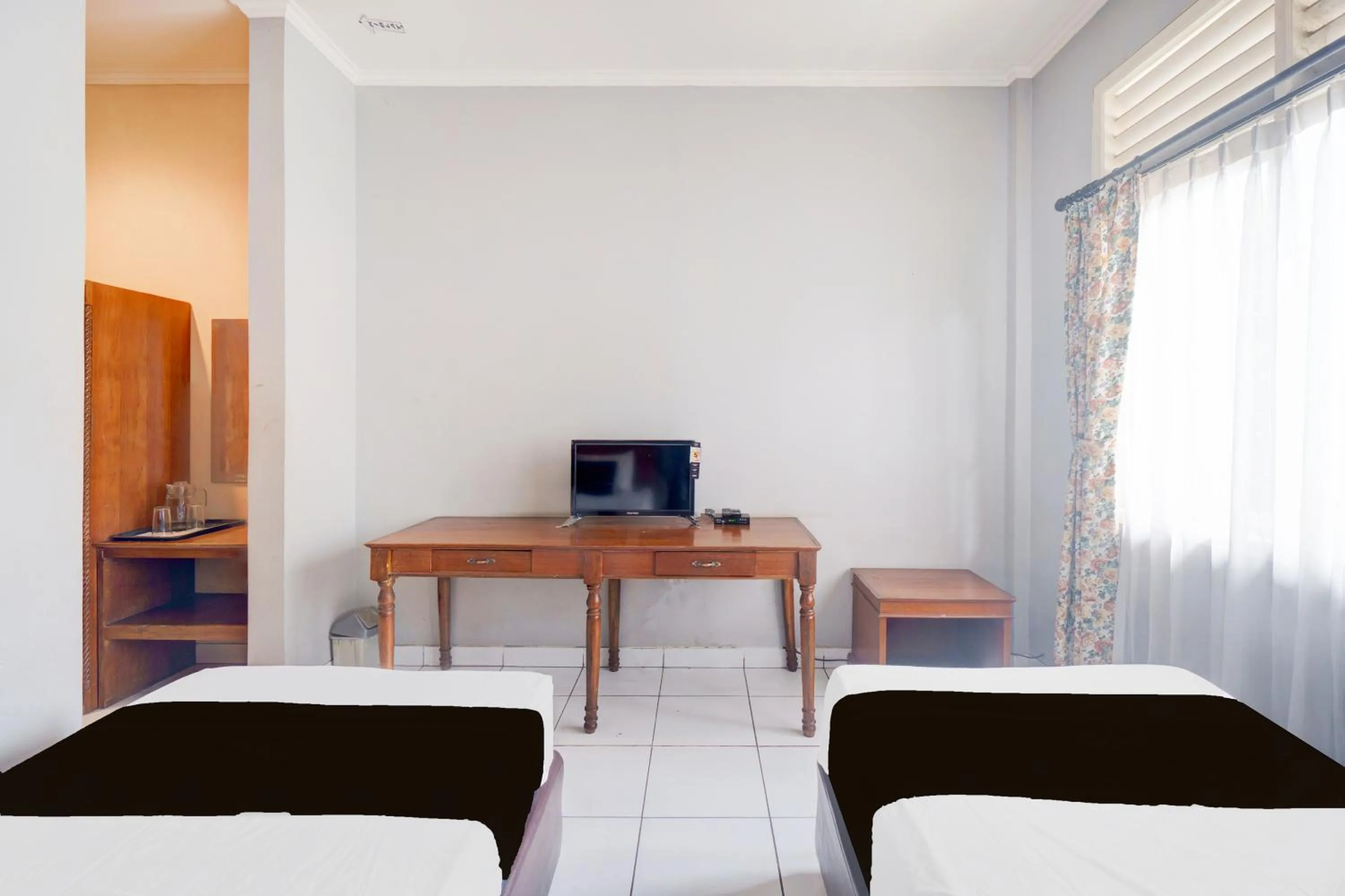 Photo of the whole room in Hotel O Bogor near Taman Safari formerly Hotel Rudian 1