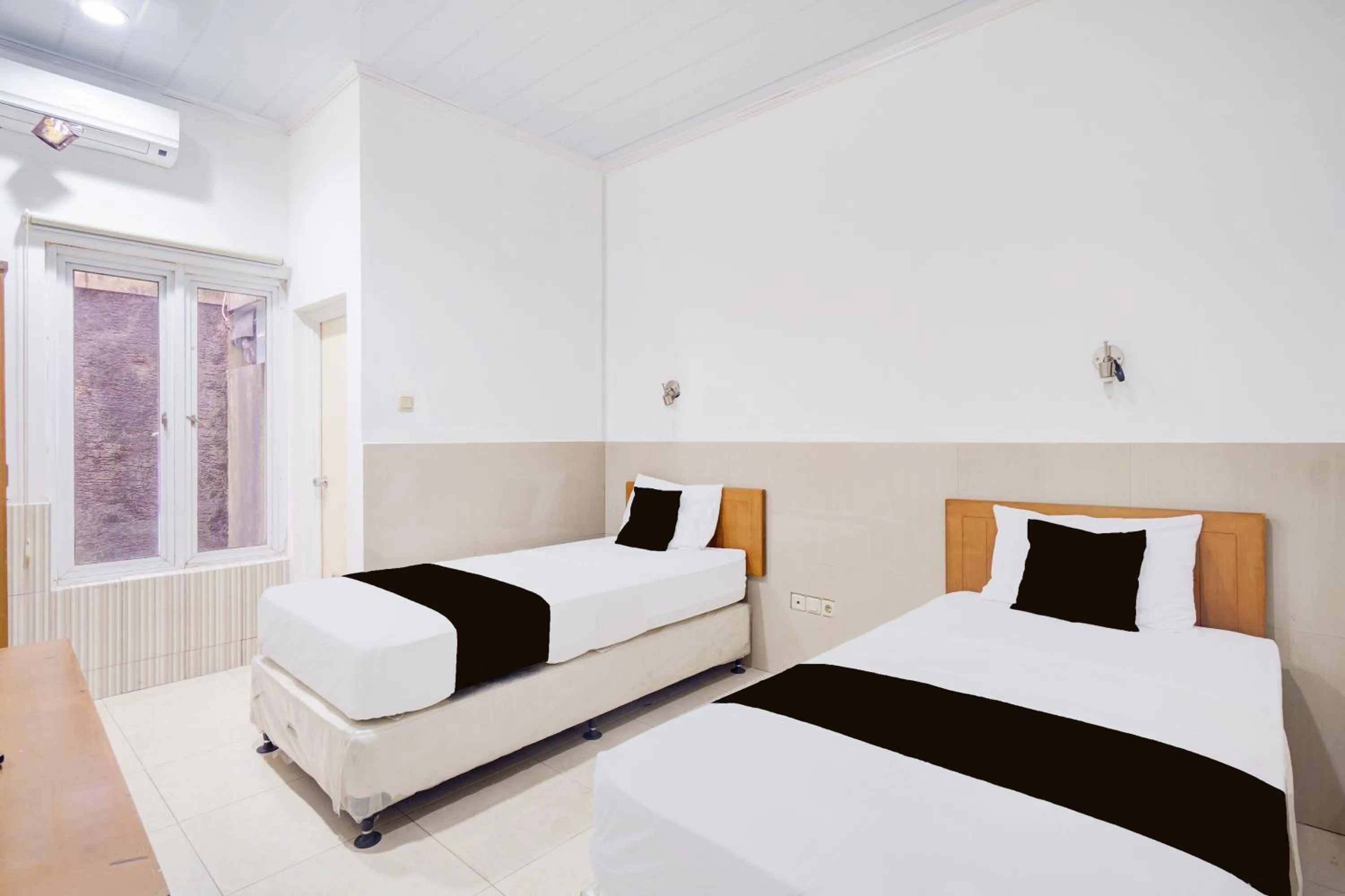 Photo of the whole room, Bed in Hotel O Bogor near Taman Safari formerly Hotel Rudian 2