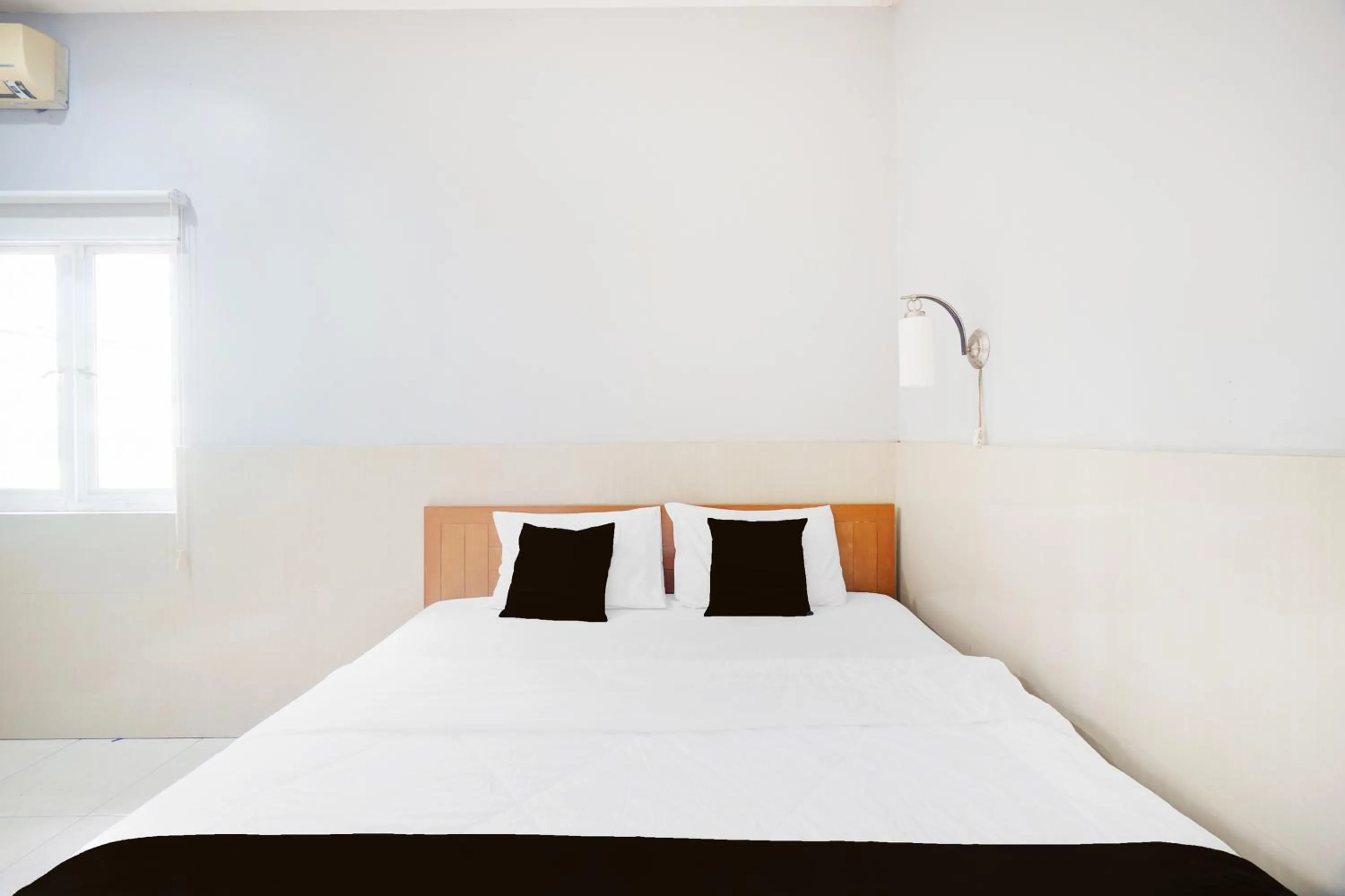 Photo of the whole room, Bed in Hotel O Bogor near Taman Safari formerly Hotel Rudian 2