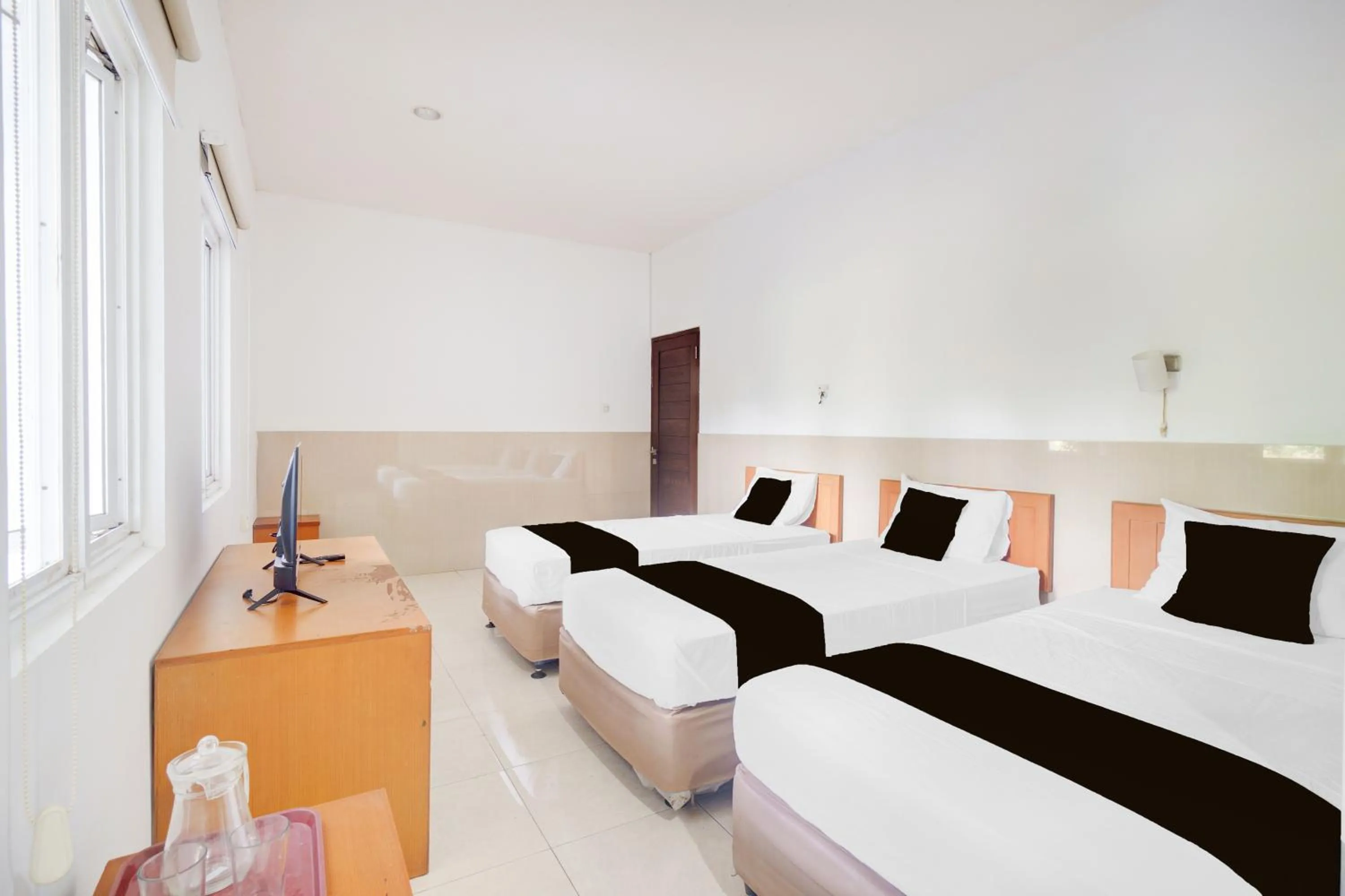 Photo of the whole room, Bed in Hotel O Bogor near Taman Safari formerly Hotel Rudian 2