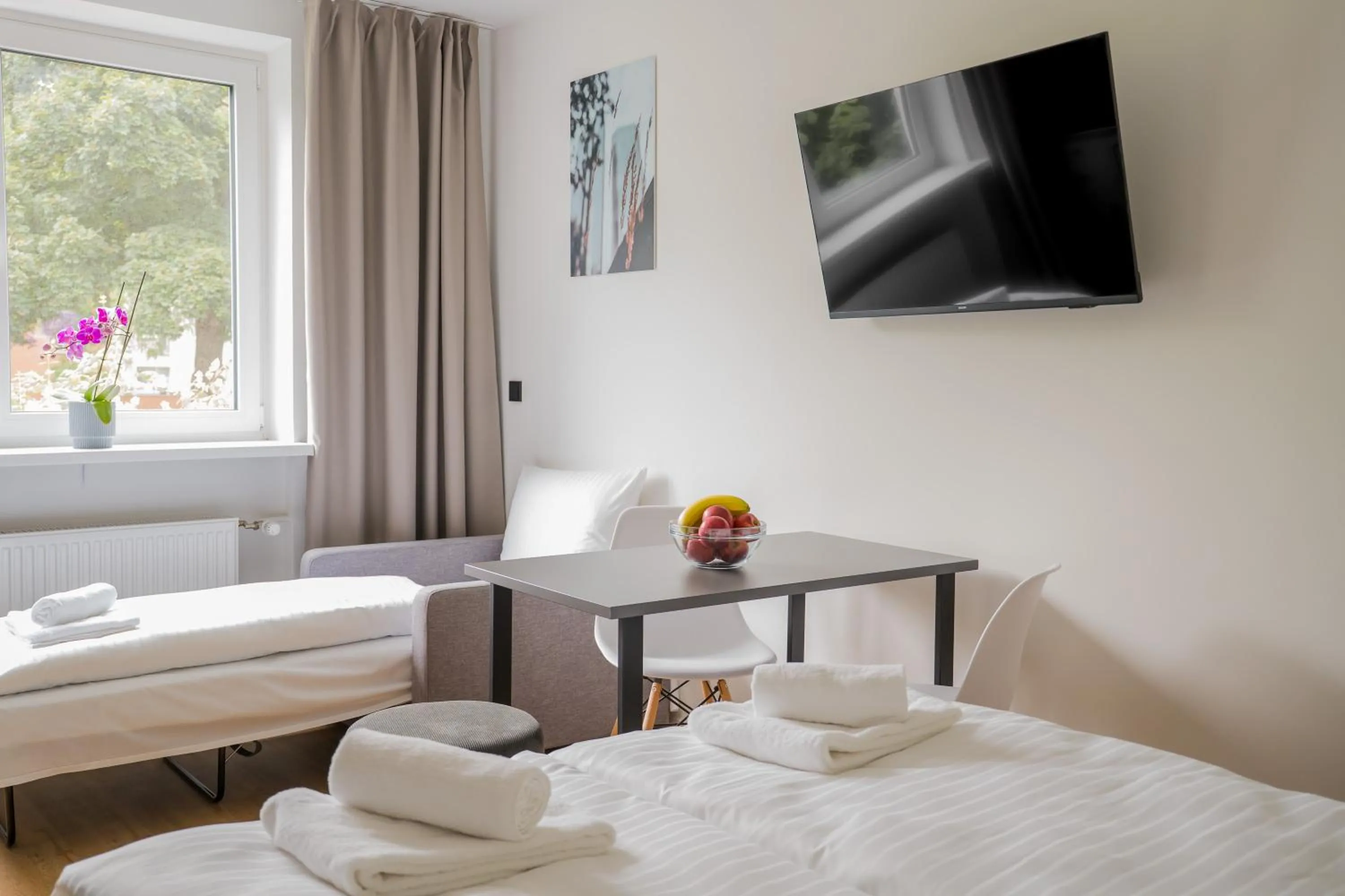 Bed in Homaris Apartments Nibelungen