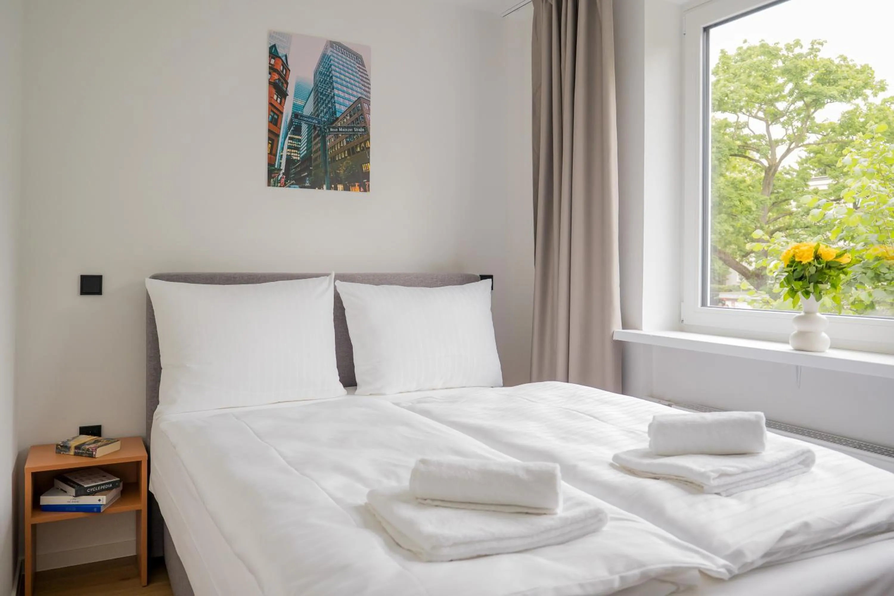 Bed in Homaris Apartments Nibelungen