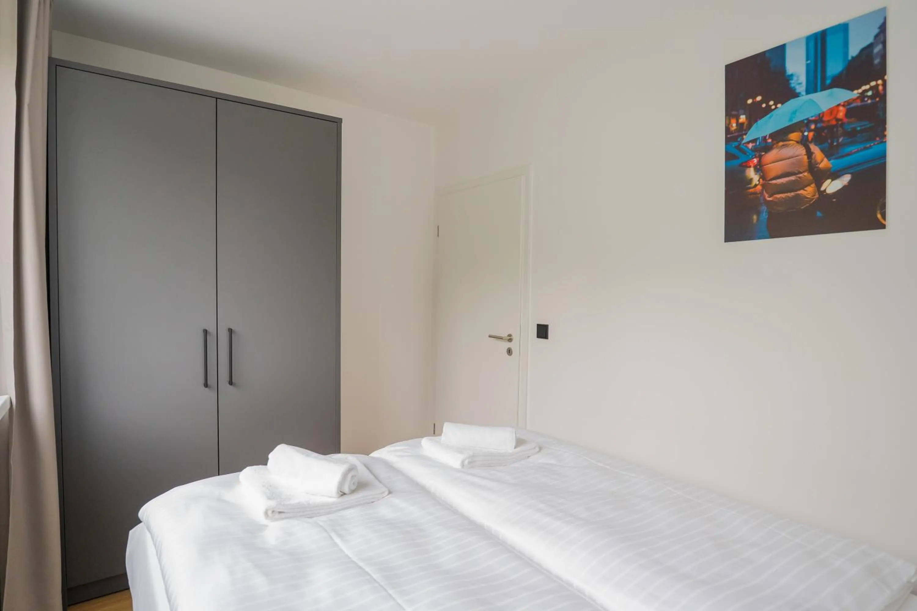 Bed in Homaris Apartments Nibelungen