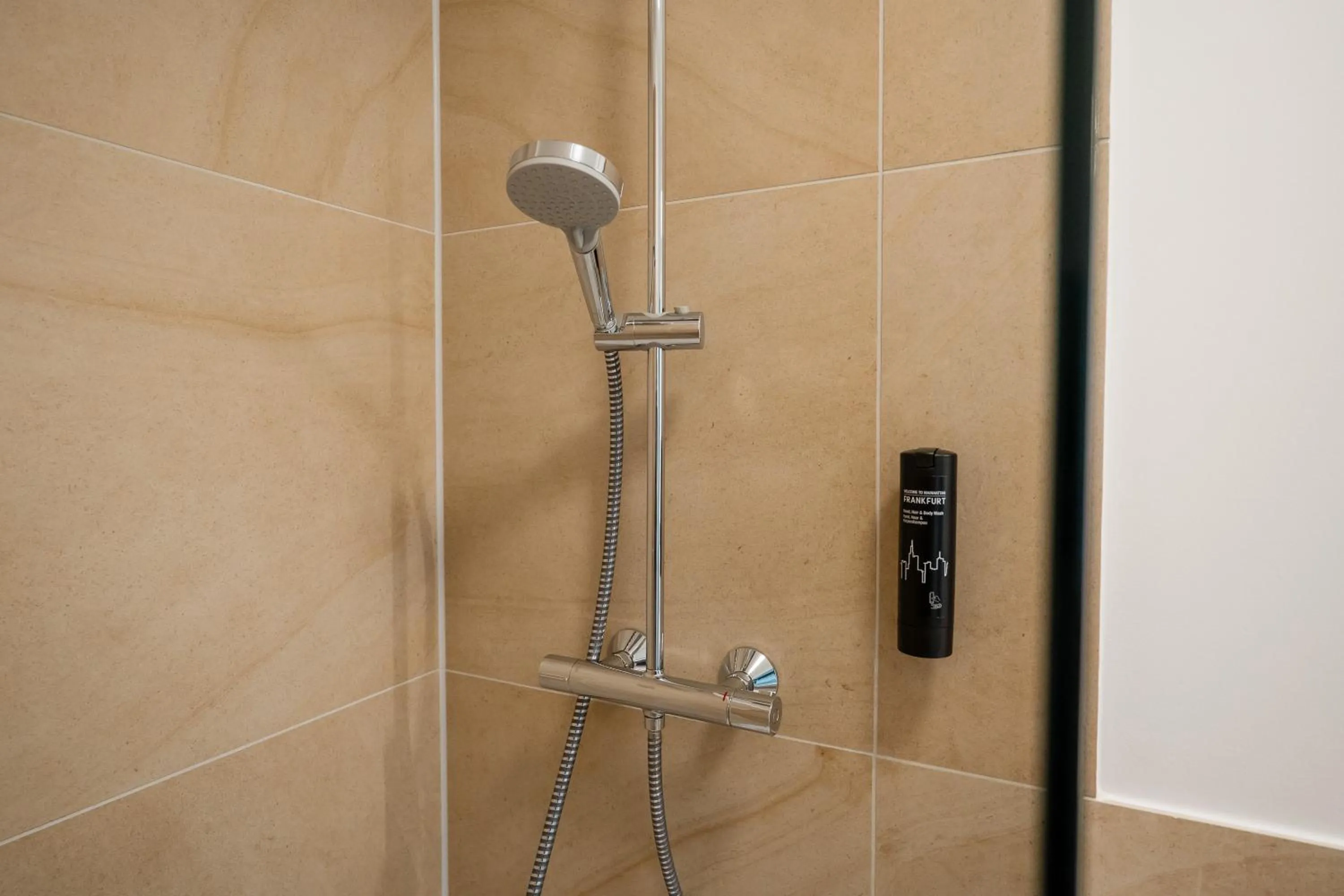 Shower in Homaris Apartments Nibelungen