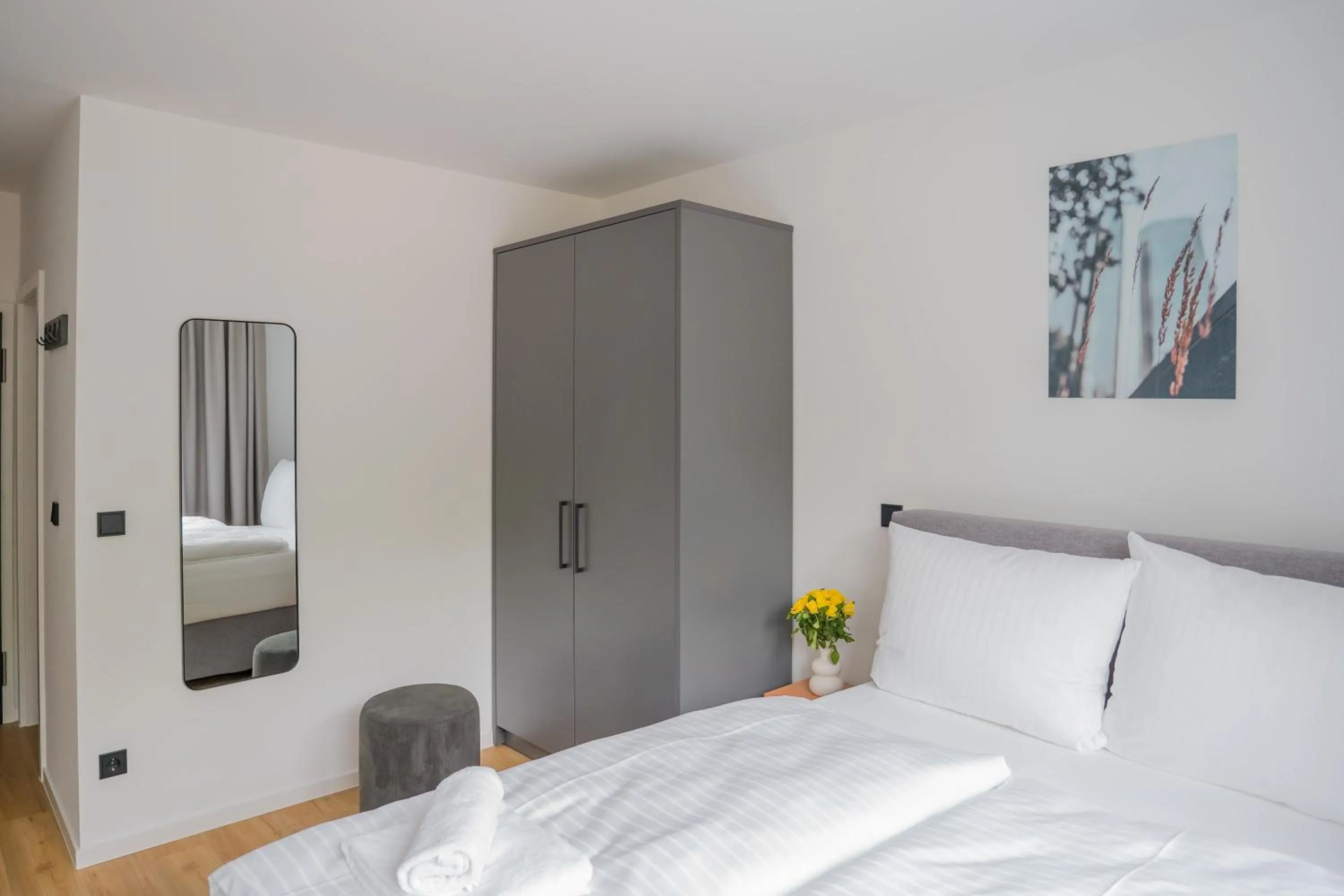 Bed in Homaris Apartments Nibelungen