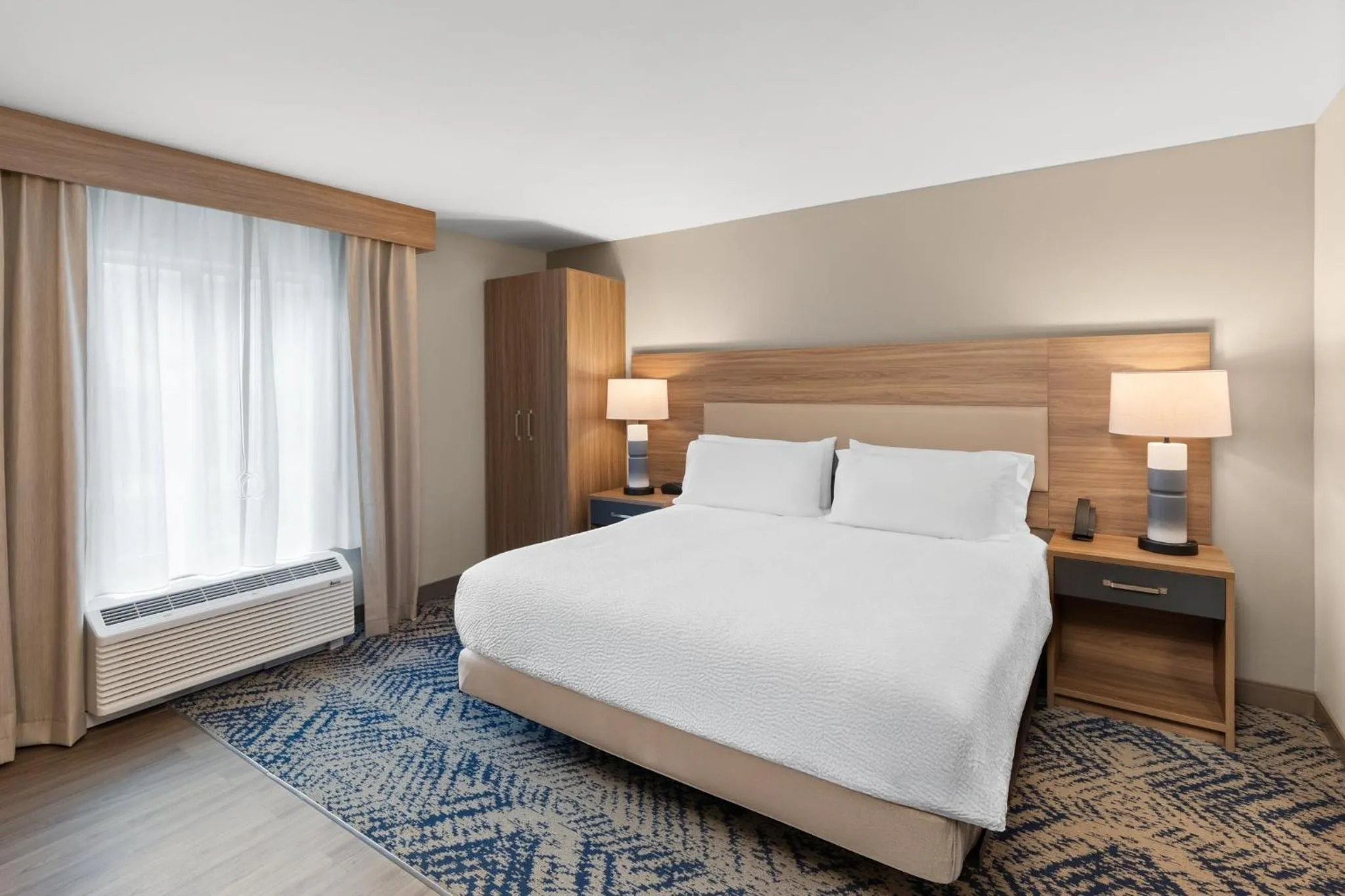 Photo of the whole room, Bed in Candlewood Suites Huntsville - Research Park by IHG