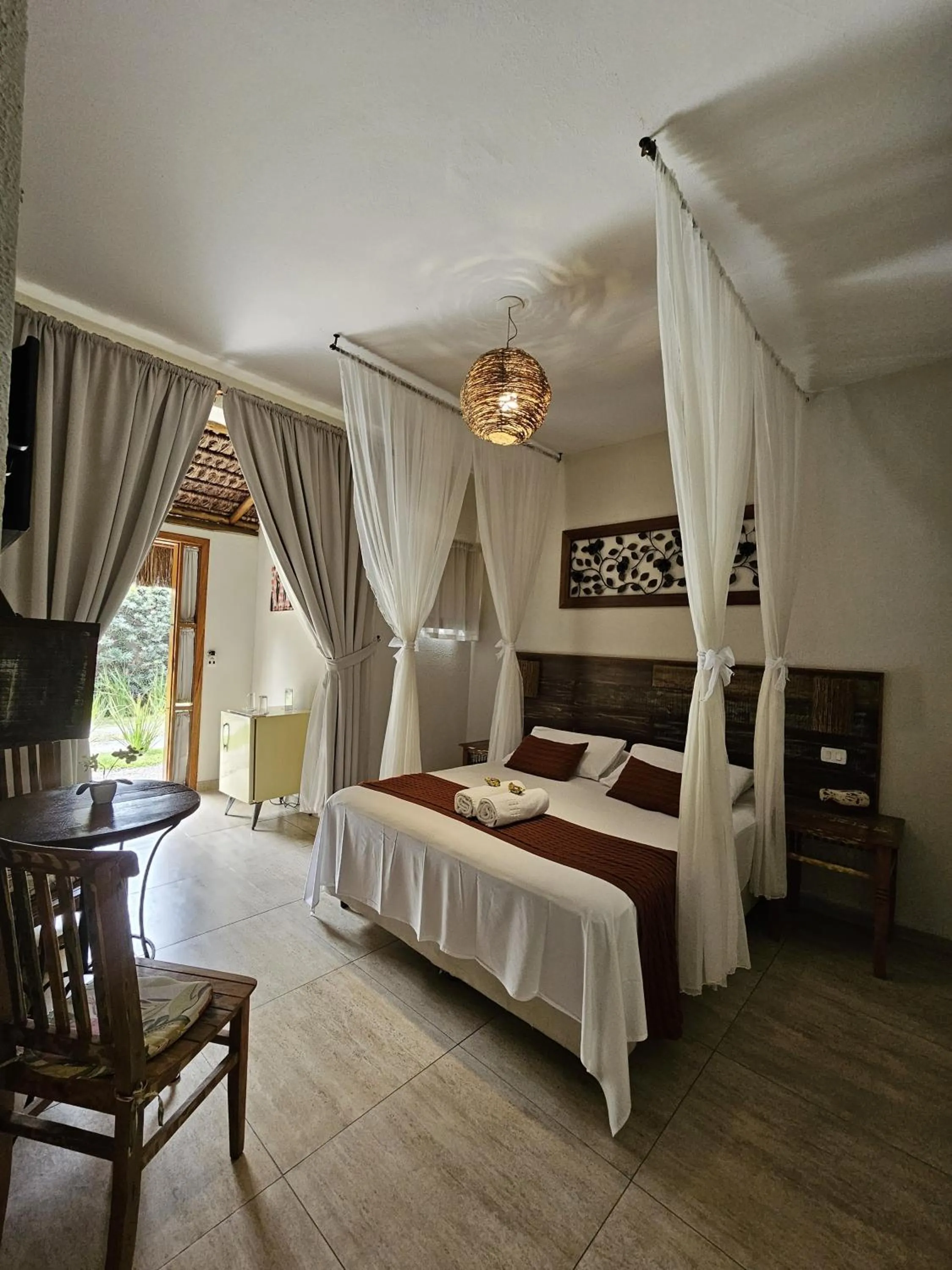 Bed in Pousada de Charme Emirados