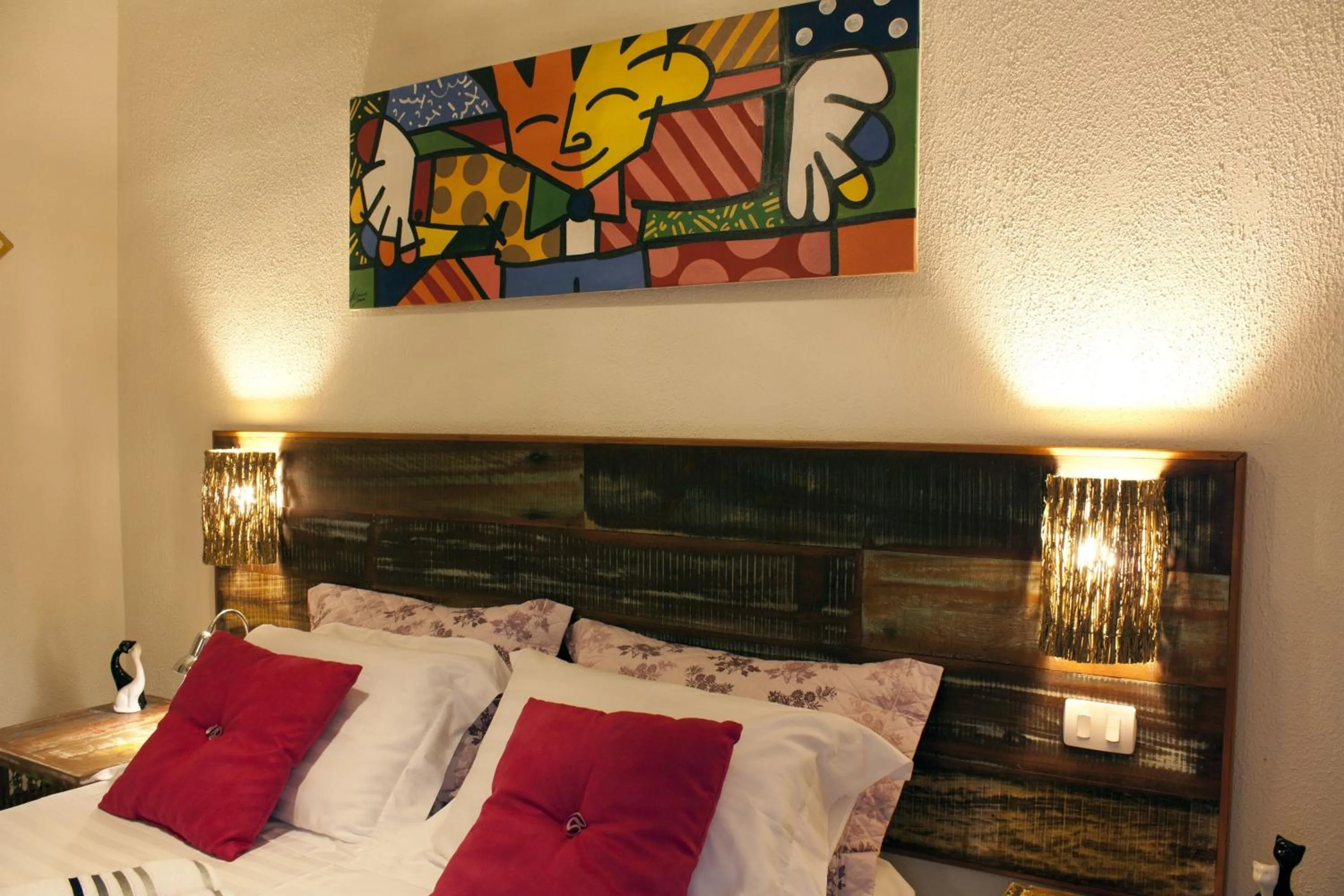 Bed in Pousada de Charme Emirados