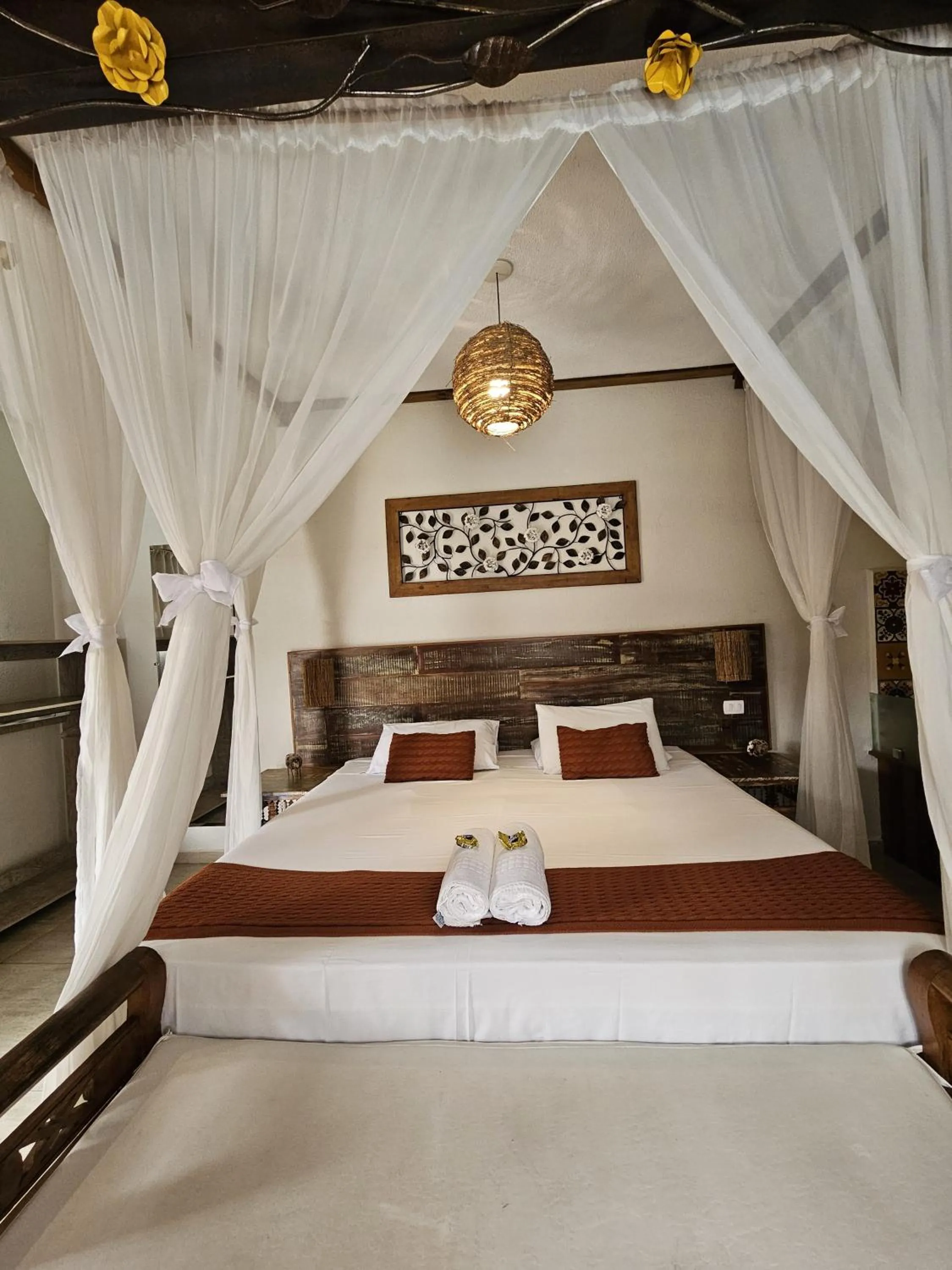 Bed in Pousada de Charme Emirados