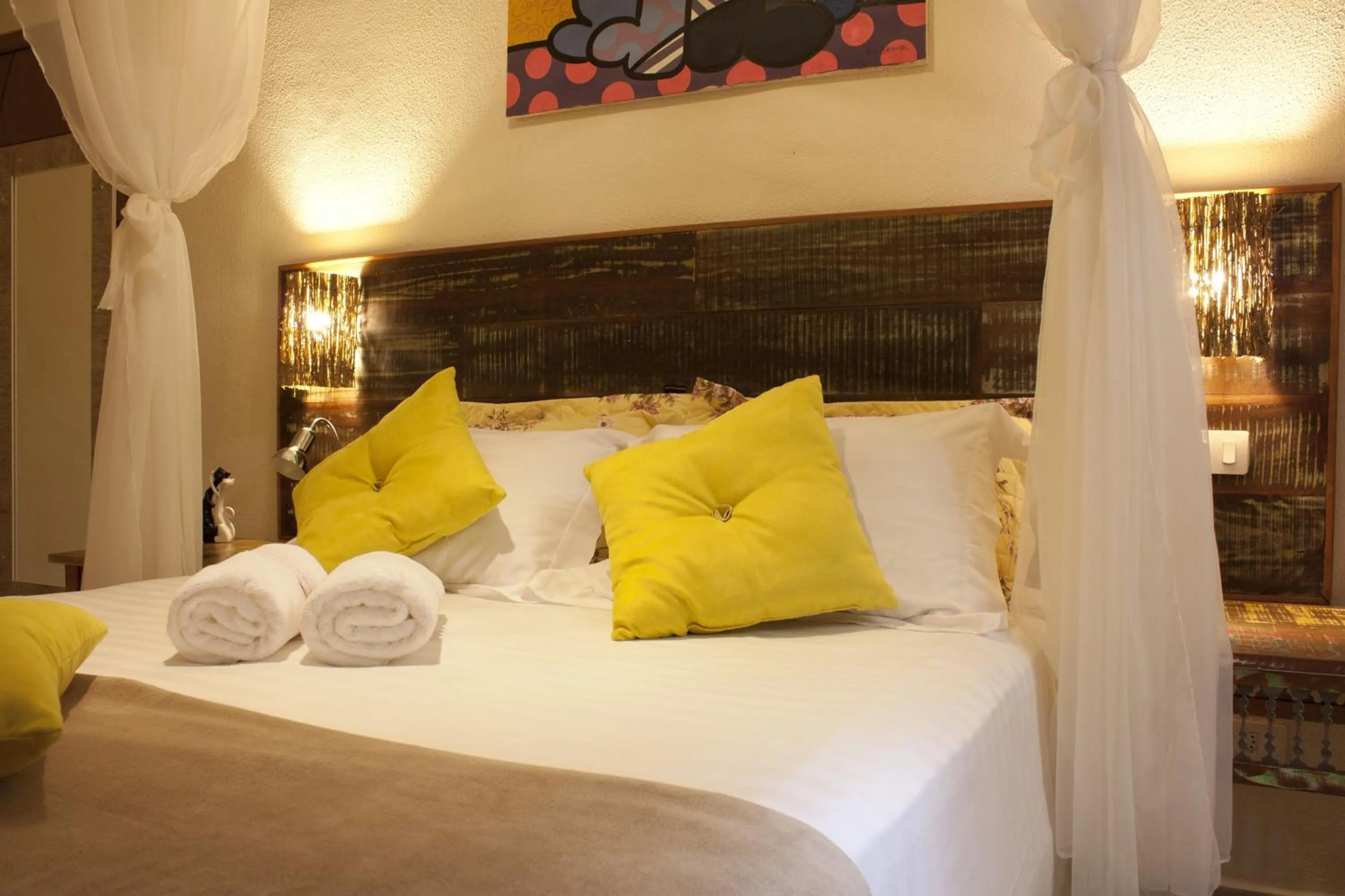 Bed in Pousada de Charme Emirados