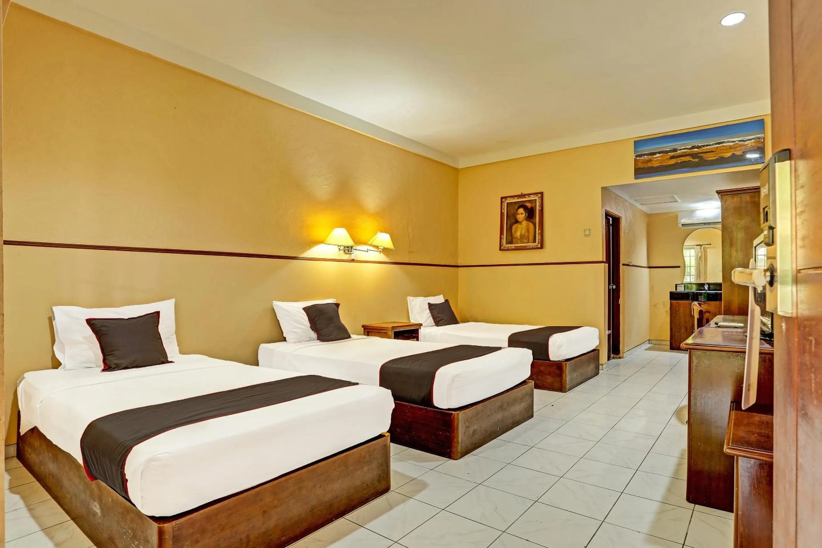 Bedroom in Collection O 91081 New Arena Hotel