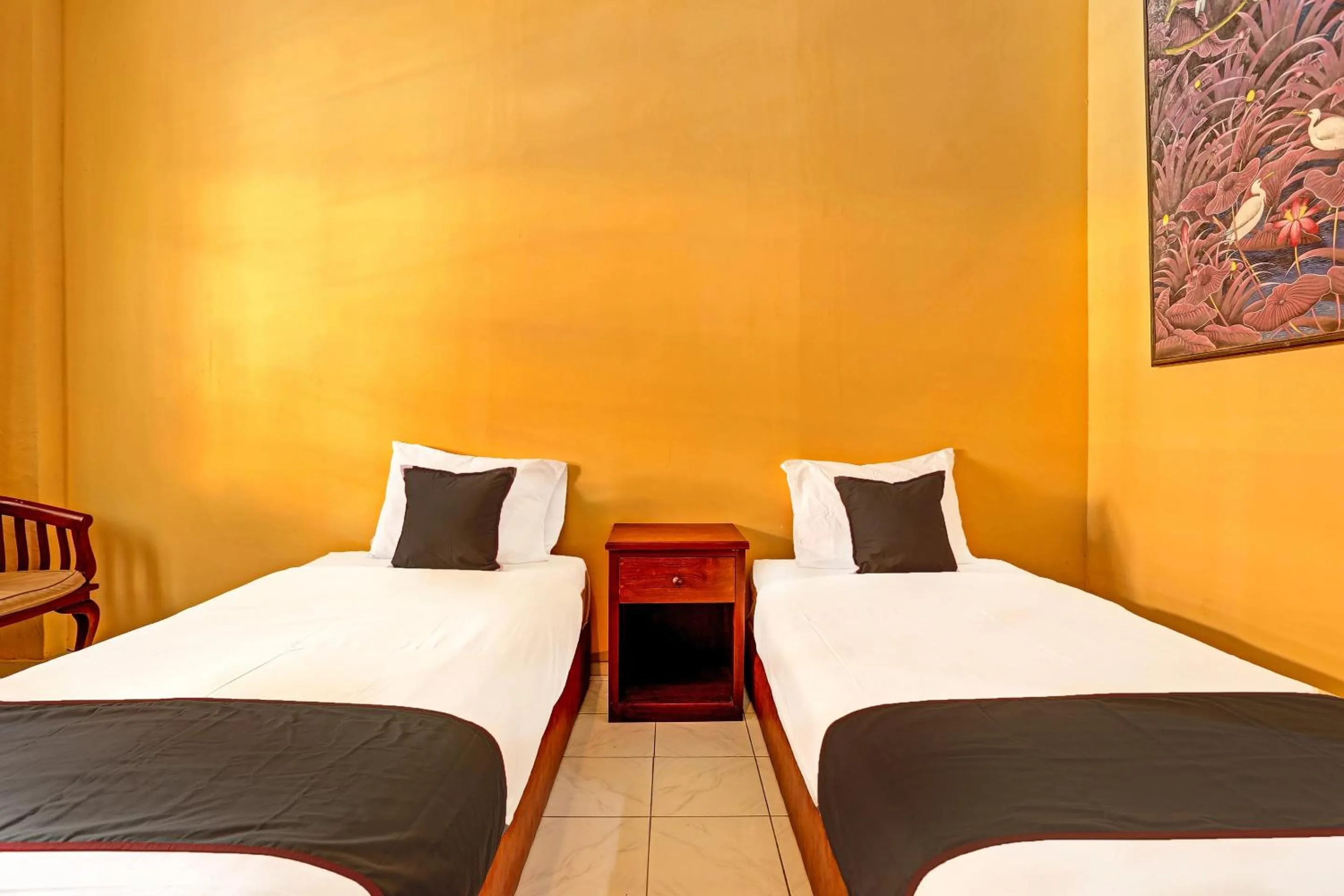 Bedroom in Collection O 91081 New Arena Hotel