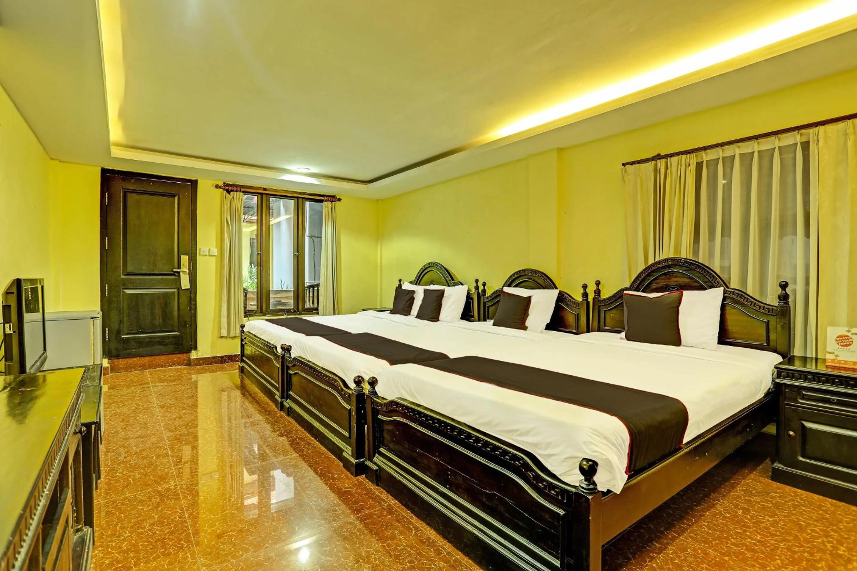 Bedroom in Collection O 91081 New Arena Hotel