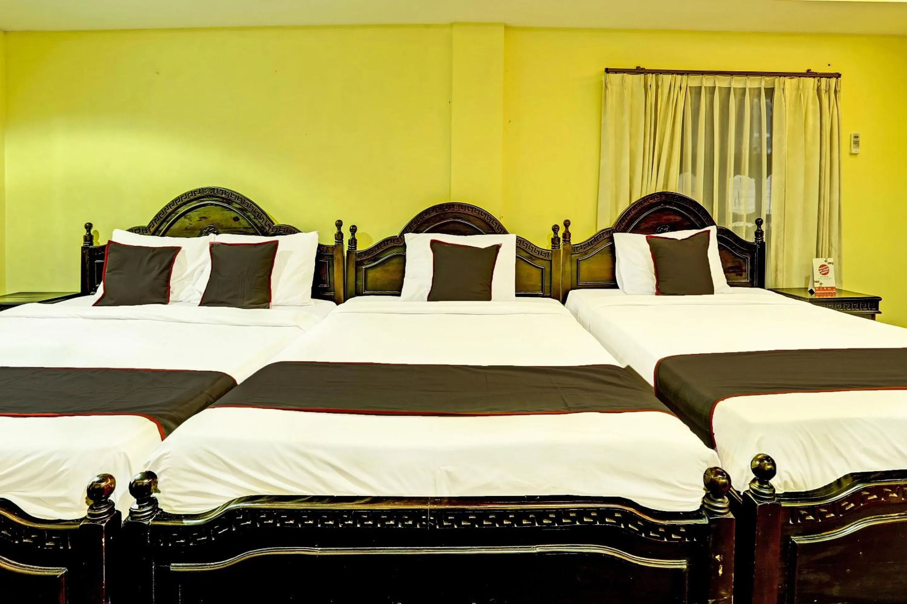 Bedroom in Collection O 91081 New Arena Hotel