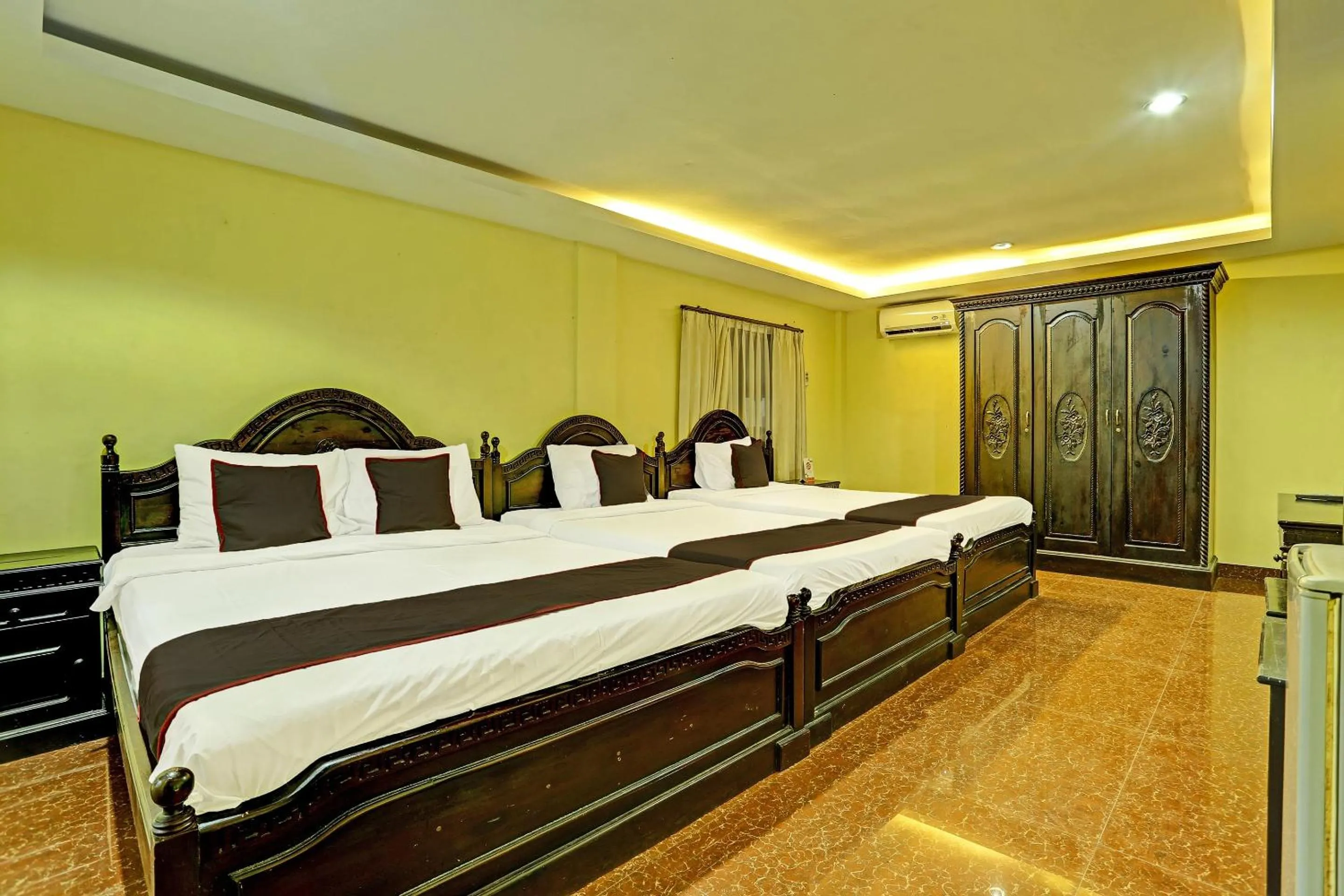 Bedroom in Collection O 91081 New Arena Hotel