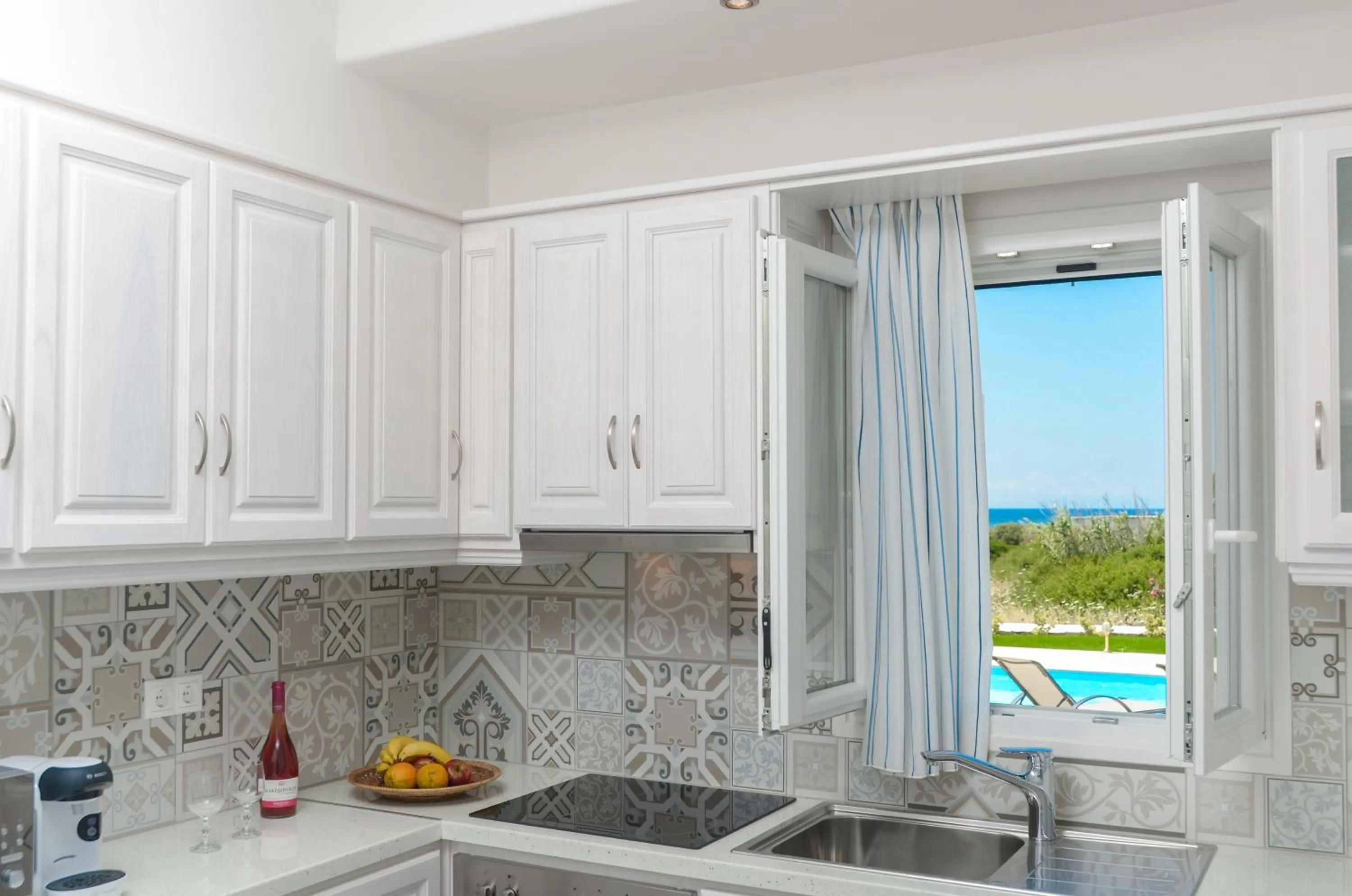 Kitchen or kitchenette in Sea & Olives Suites Hotel and Villas