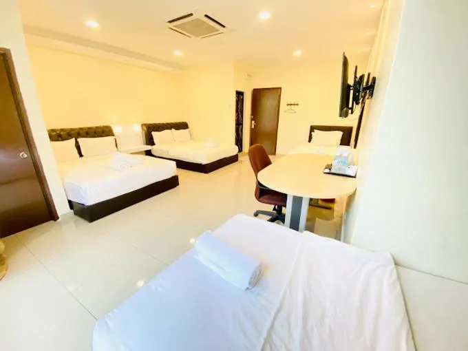 Bed in Sunsega Hotel