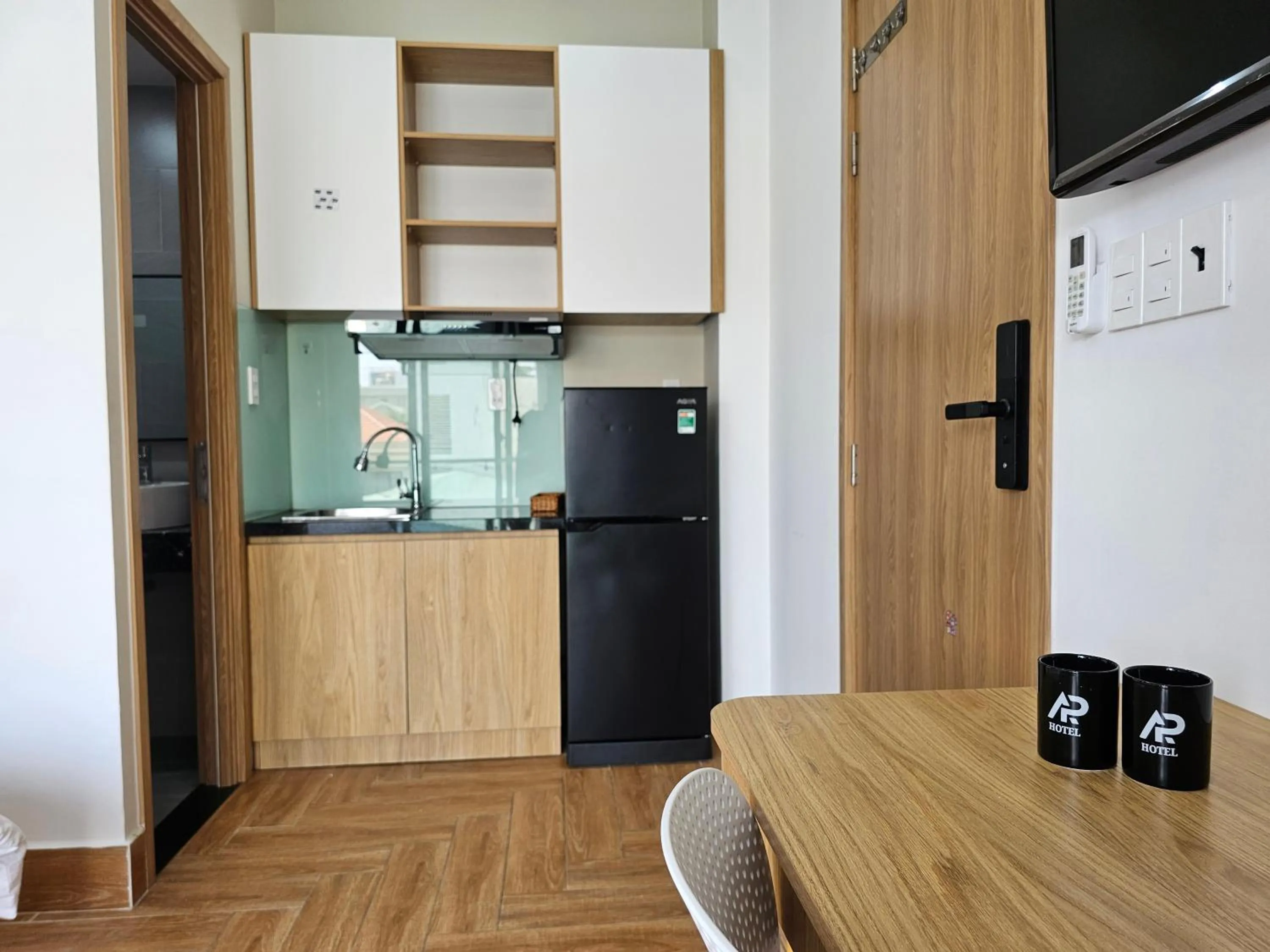 Kitchen or kitchenette in APEC Hotel