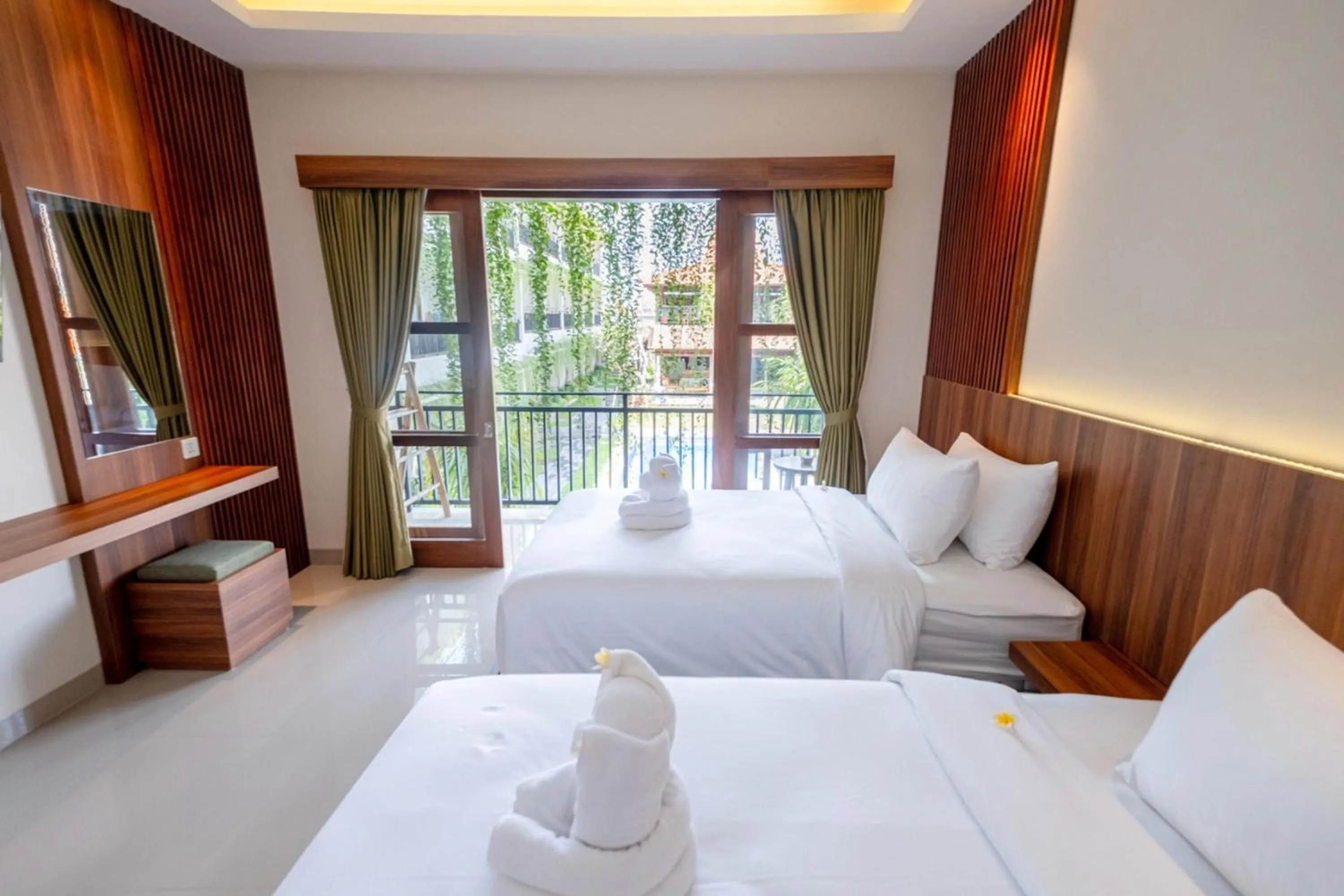 towels, Bed in Puri Kaja House