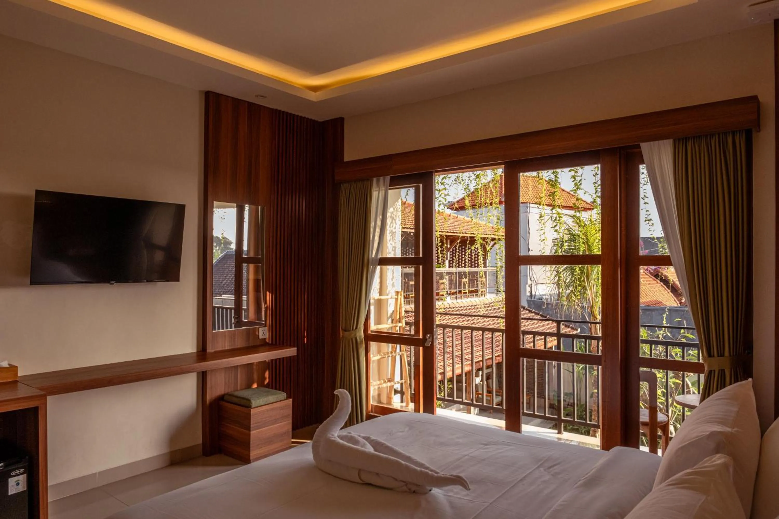 Communal lounge/ TV room, Bed in Puri Kaja House