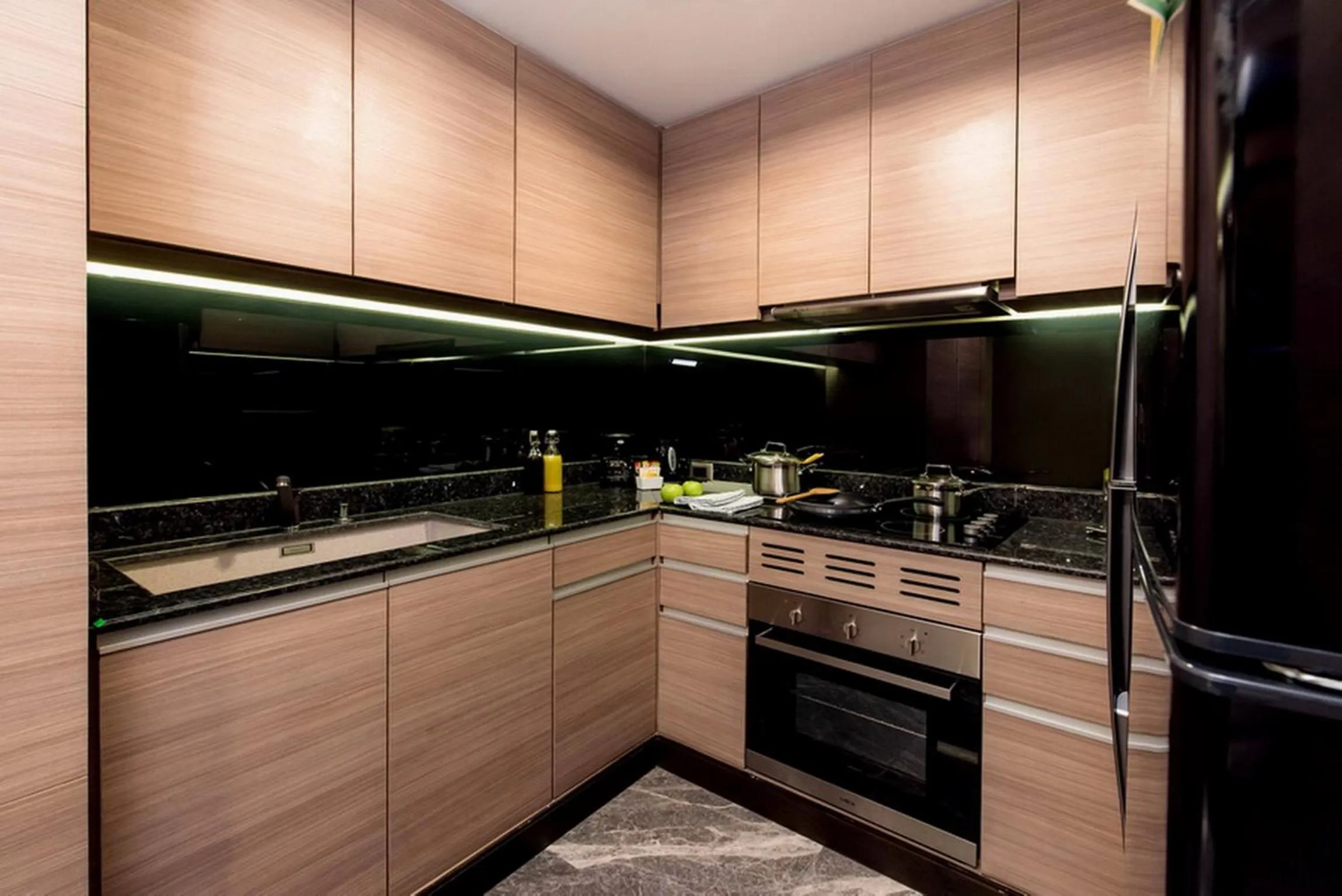 kitchen in Qiss Residence by Bliston