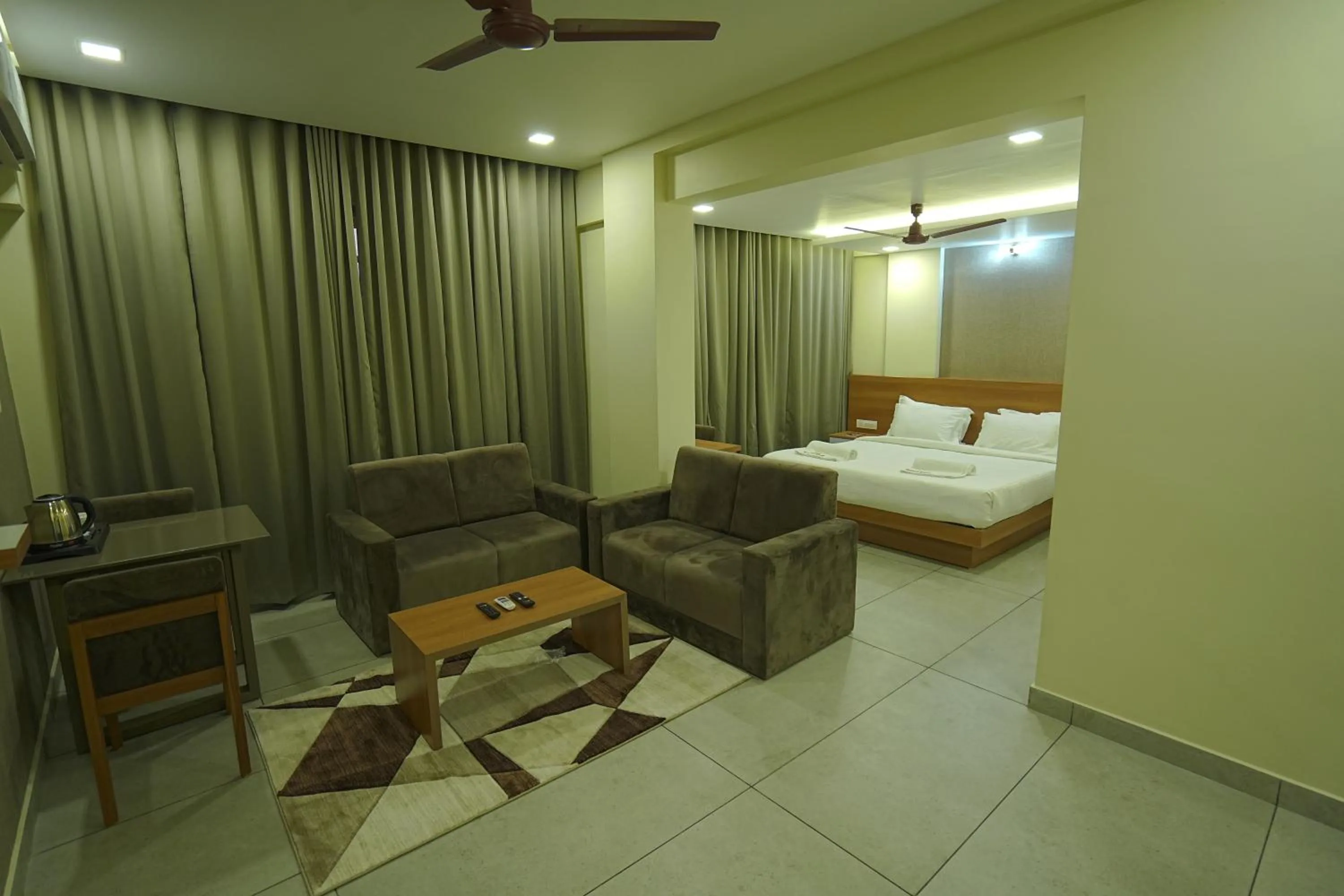 Seating area, Bed in Royal Casa Cochin