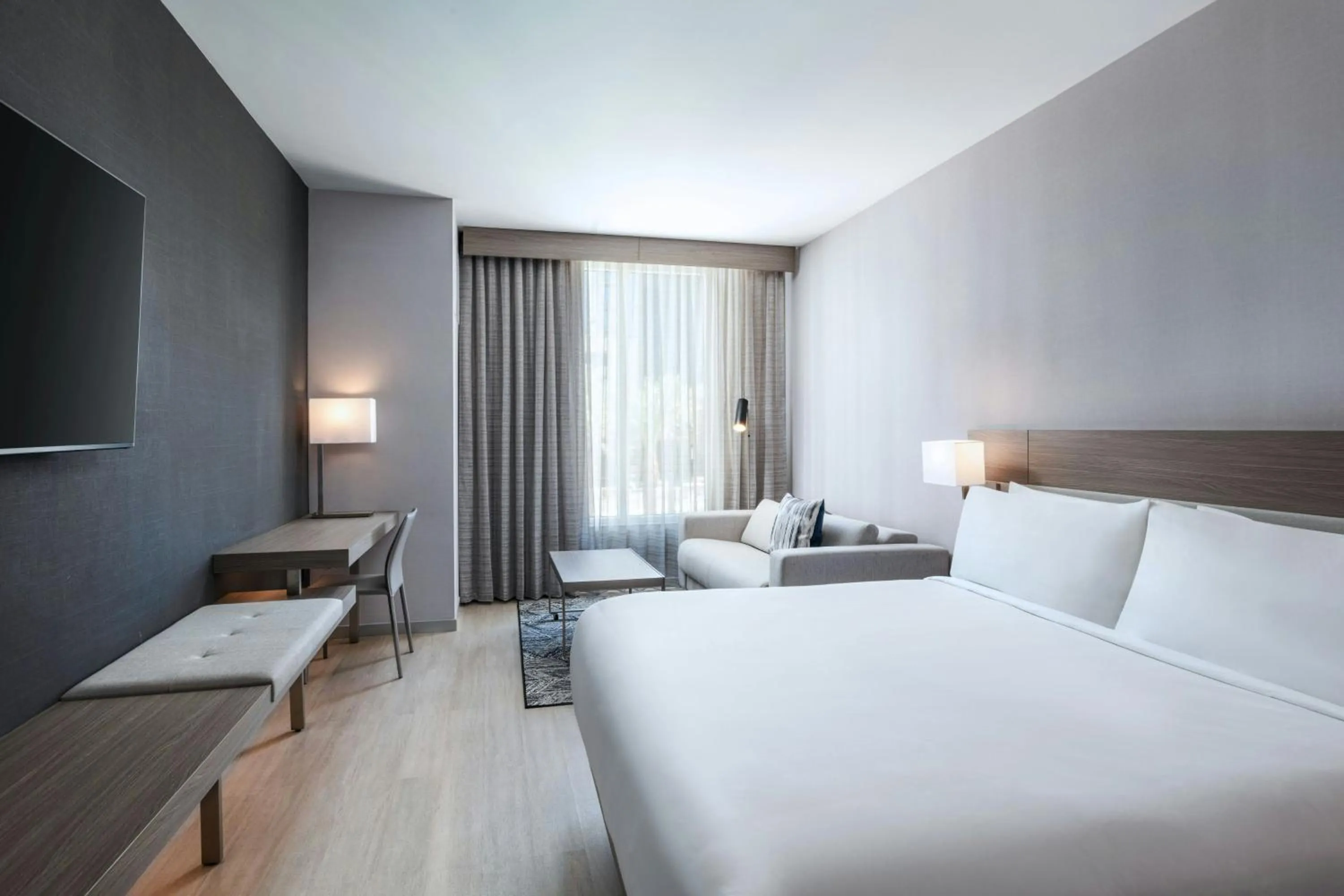 Photo of the whole room, Bed in AC Hotel by Marriott Las Vegas Symphony Park