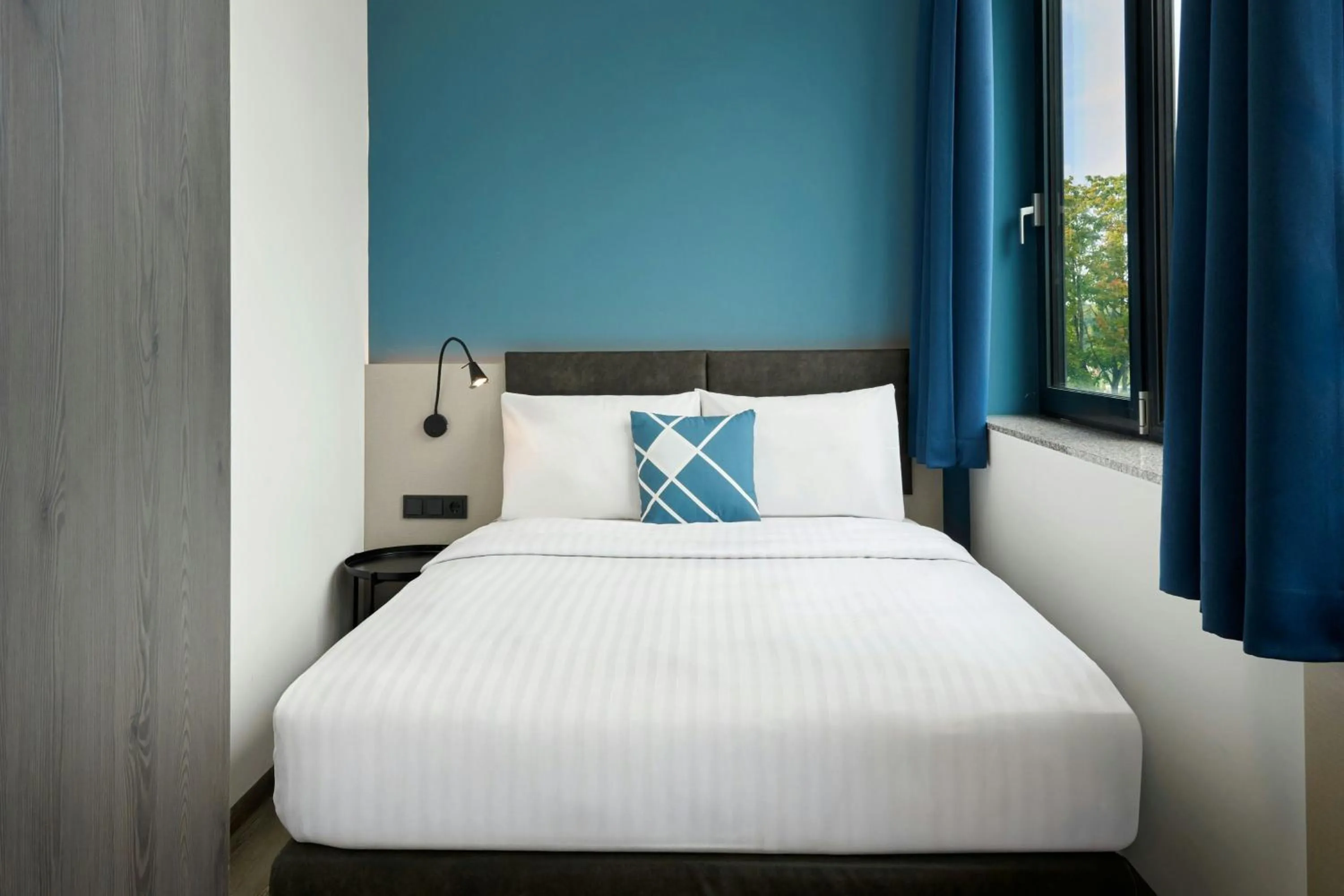 Photo of the whole room, Bed in Four Points Flex by Sheraton Östringen