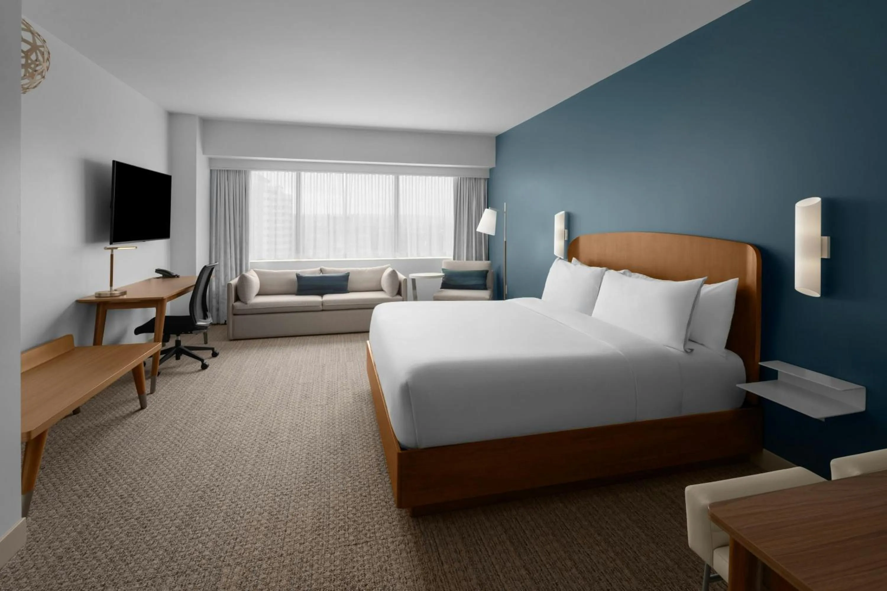 Living room, Bed in Element Calgary Downtown