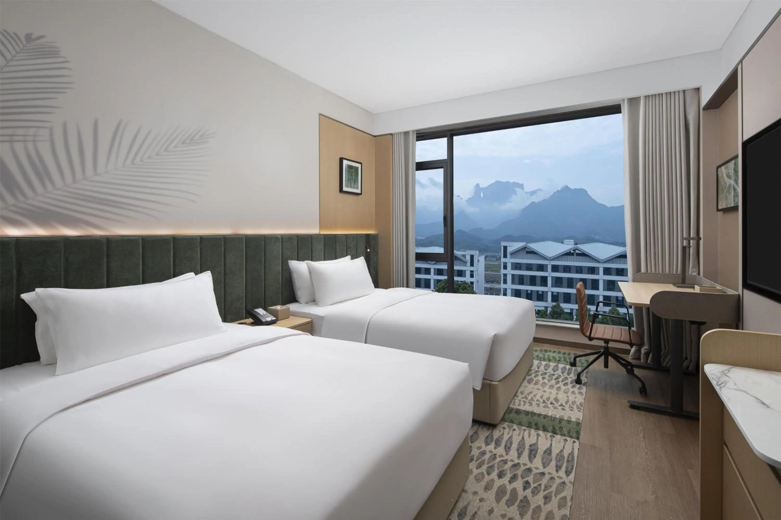 Bed in Hilton Garden Inn Zhangjiajie Tianmen Mountain