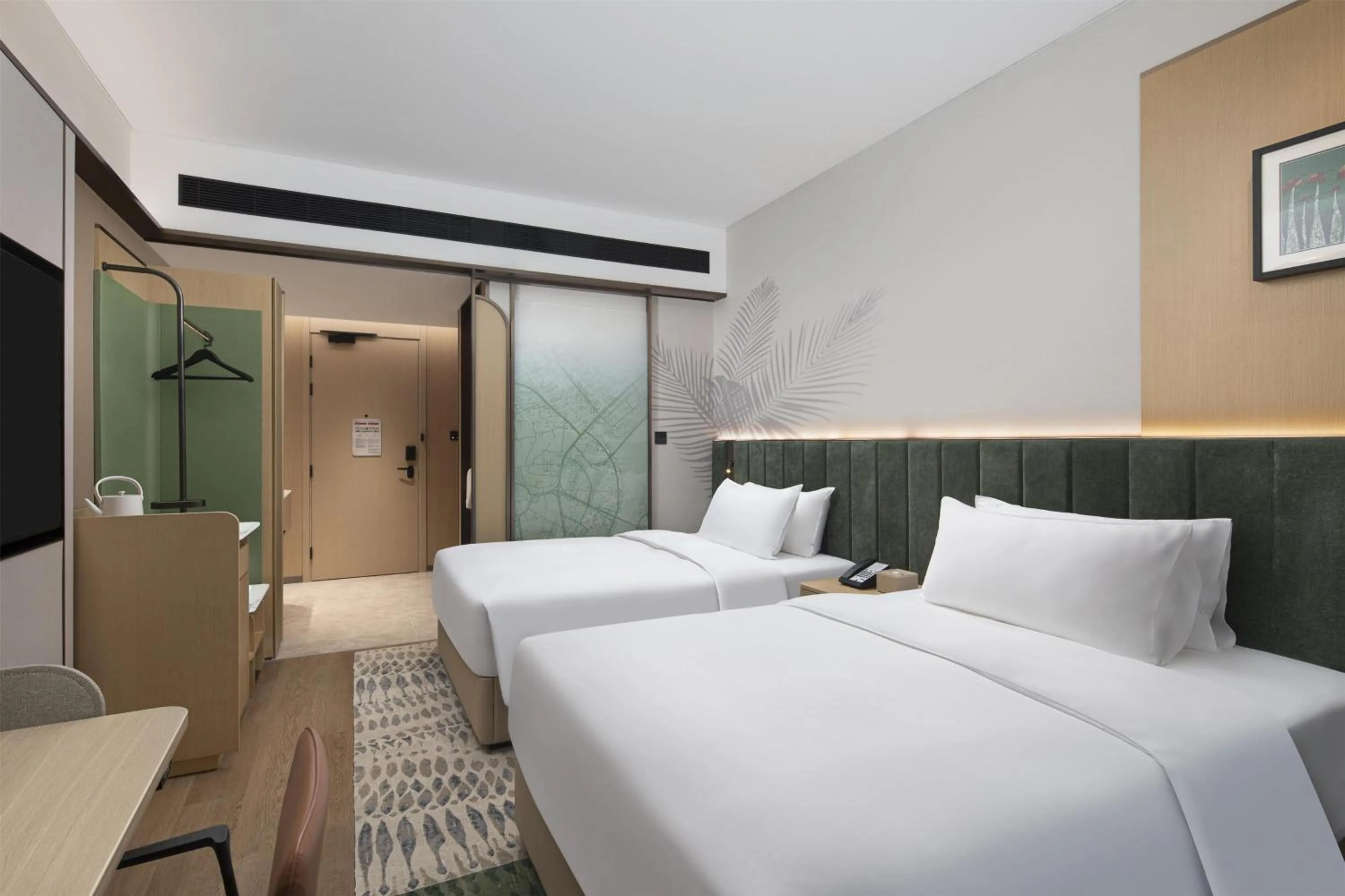 Bed in Hilton Garden Inn Zhangjiajie Tianmen Mountain